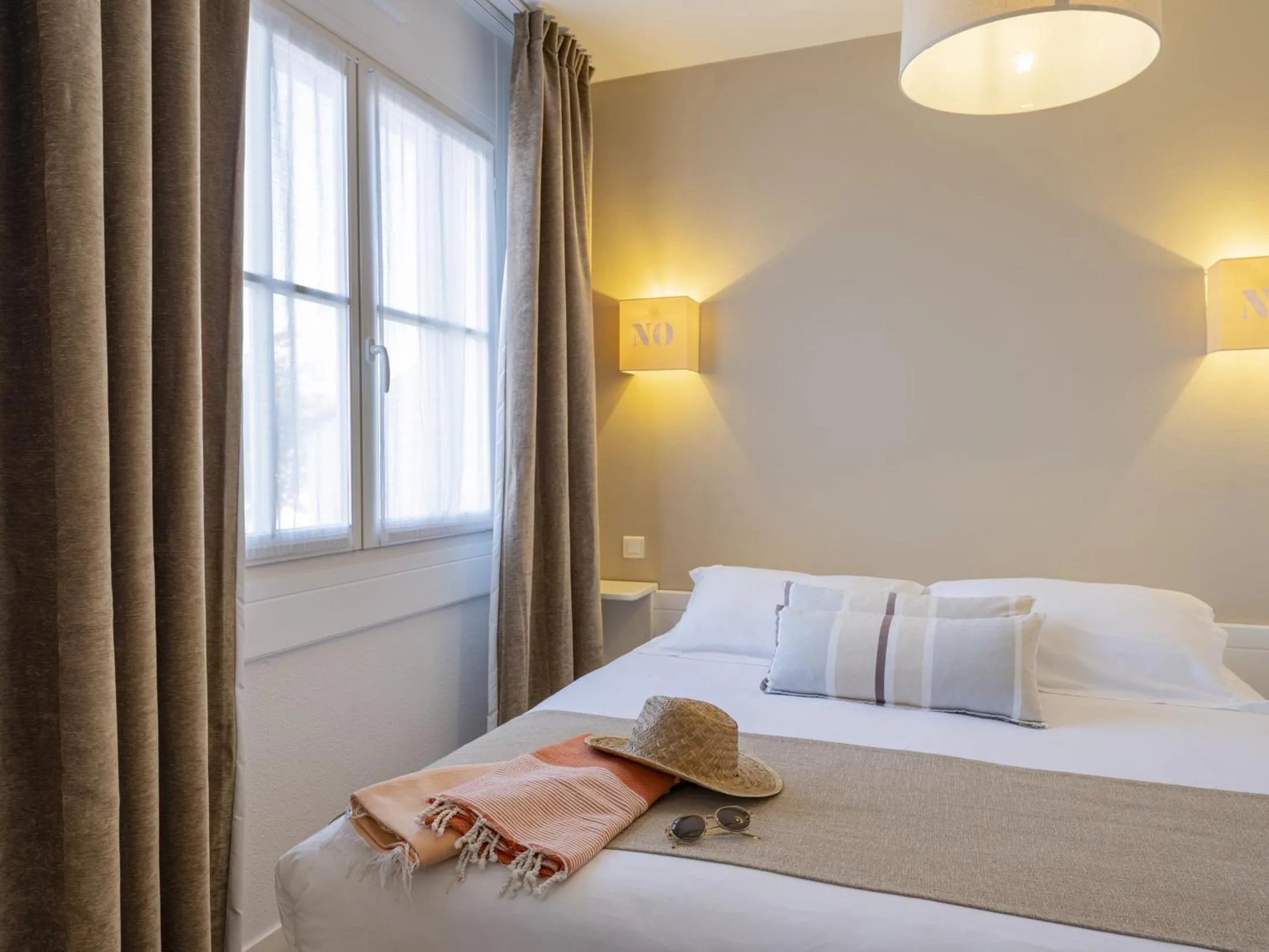 Bed in Hotel Autre Mer