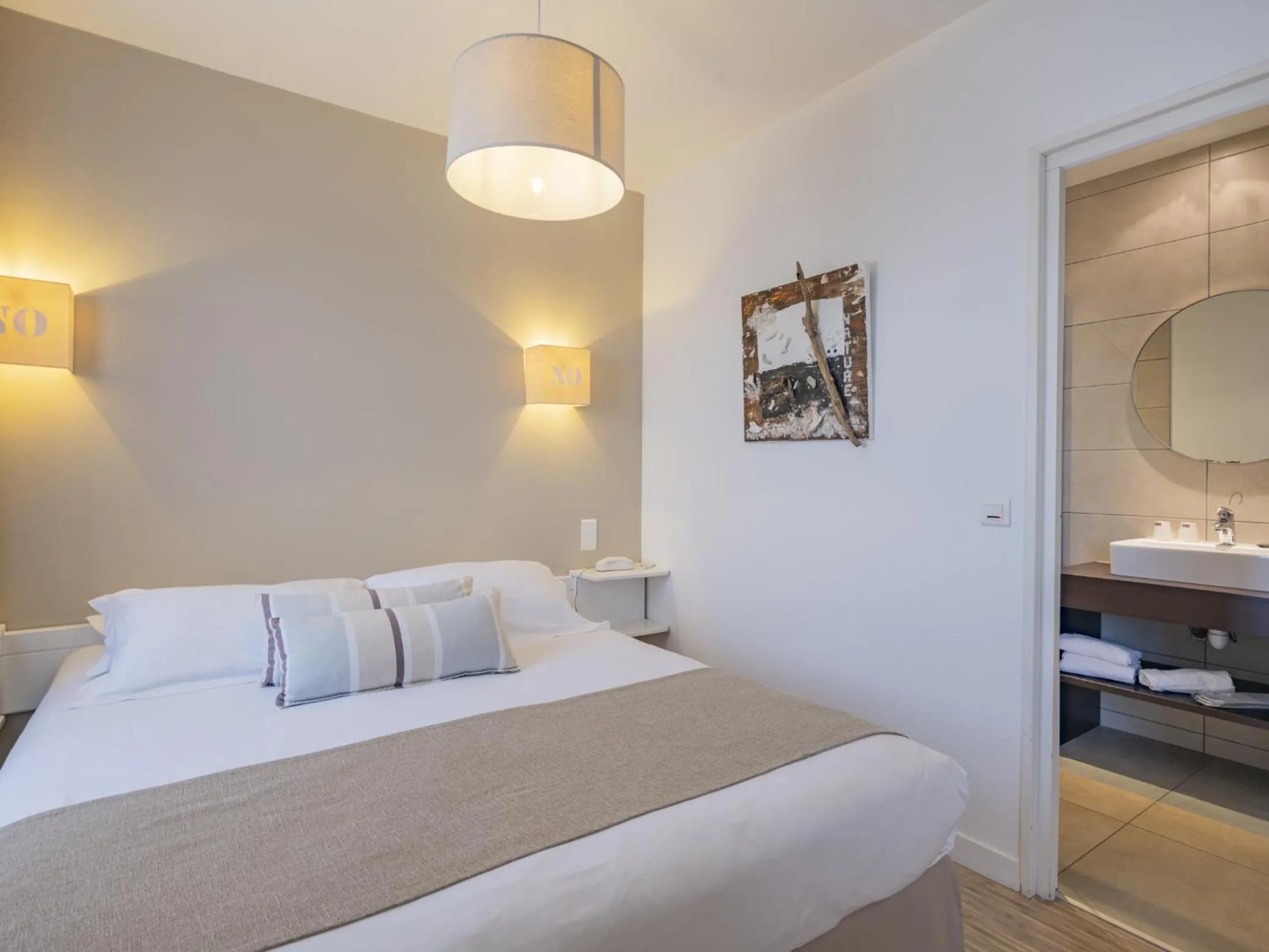 Bed in Hotel Autre Mer