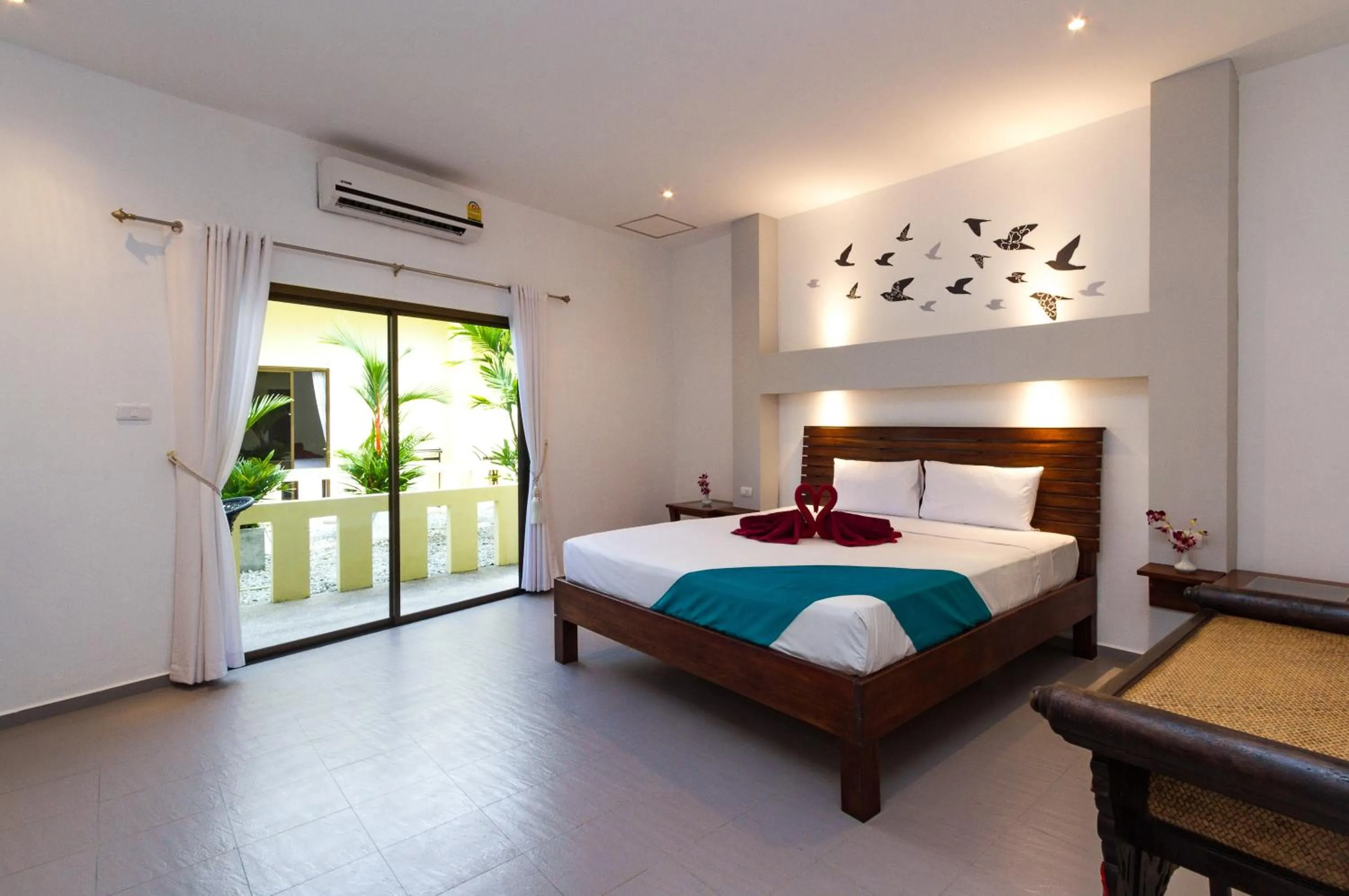 Photo of the whole room, Bed in Austrian Garden Hotel & Restaurant Patong