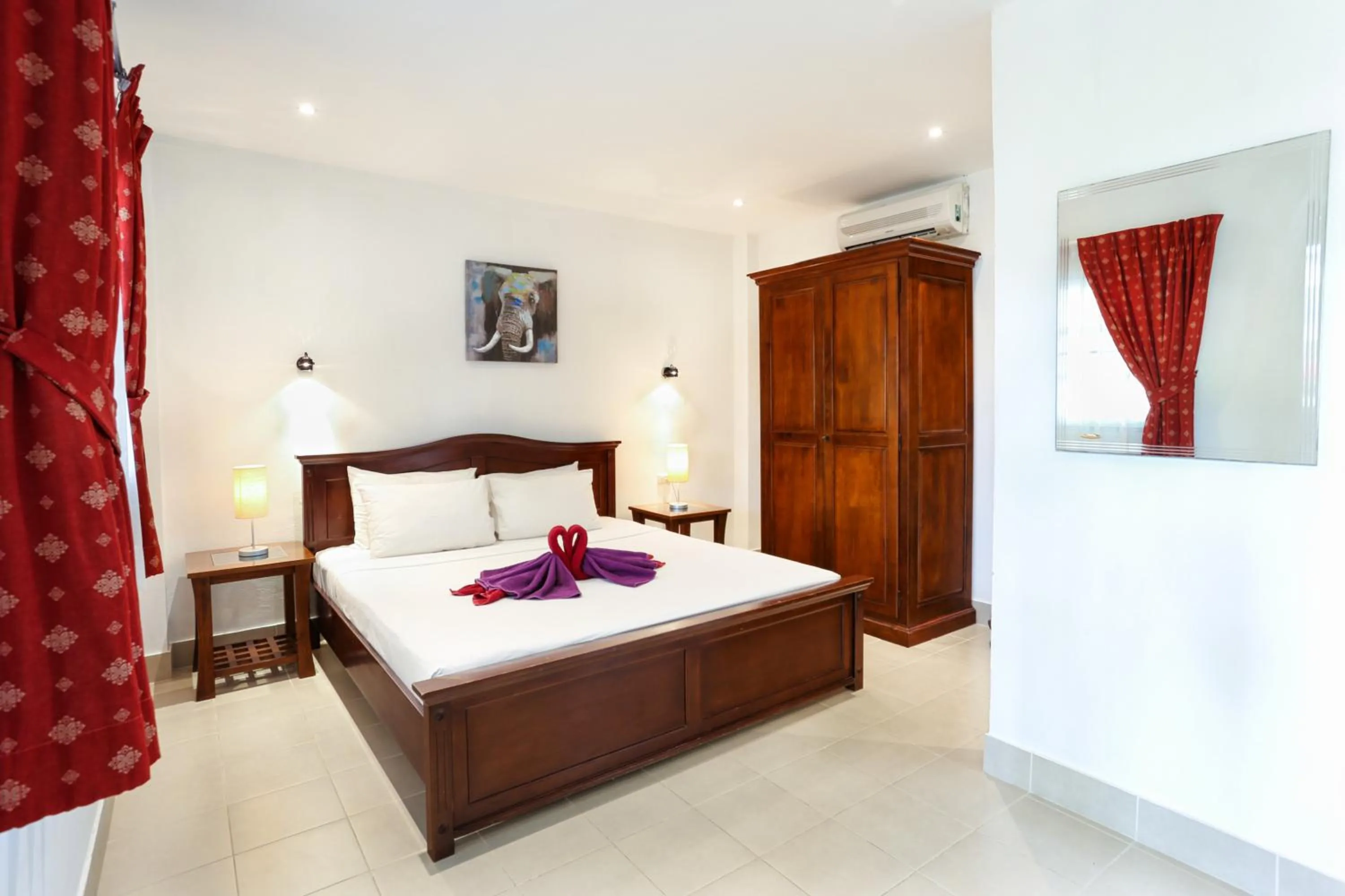 Photo of the whole room, Bed in Austrian Garden Hotel & Restaurant Patong