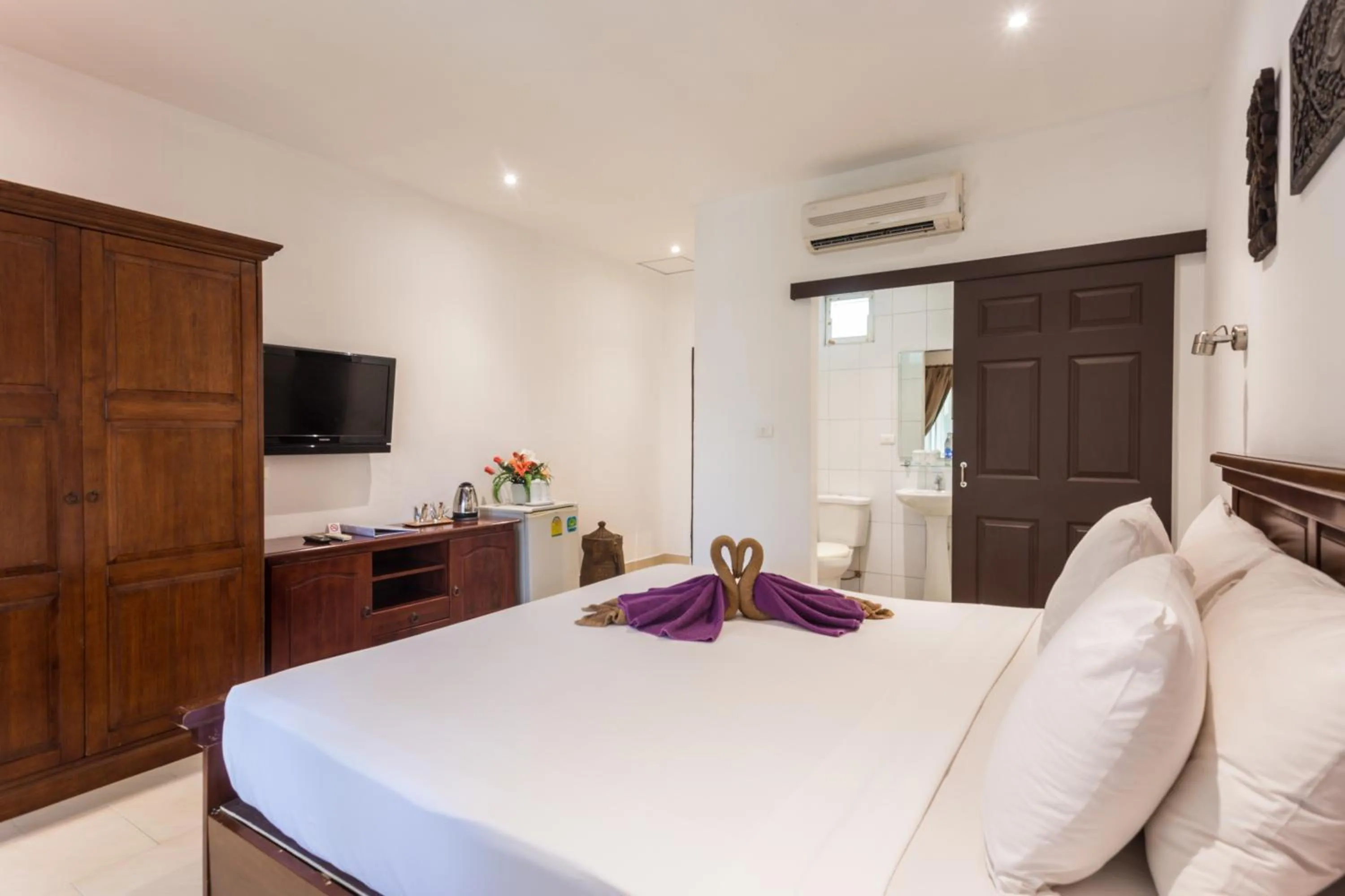 Photo of the whole room, Bed in Austrian Garden Hotel & Restaurant Patong