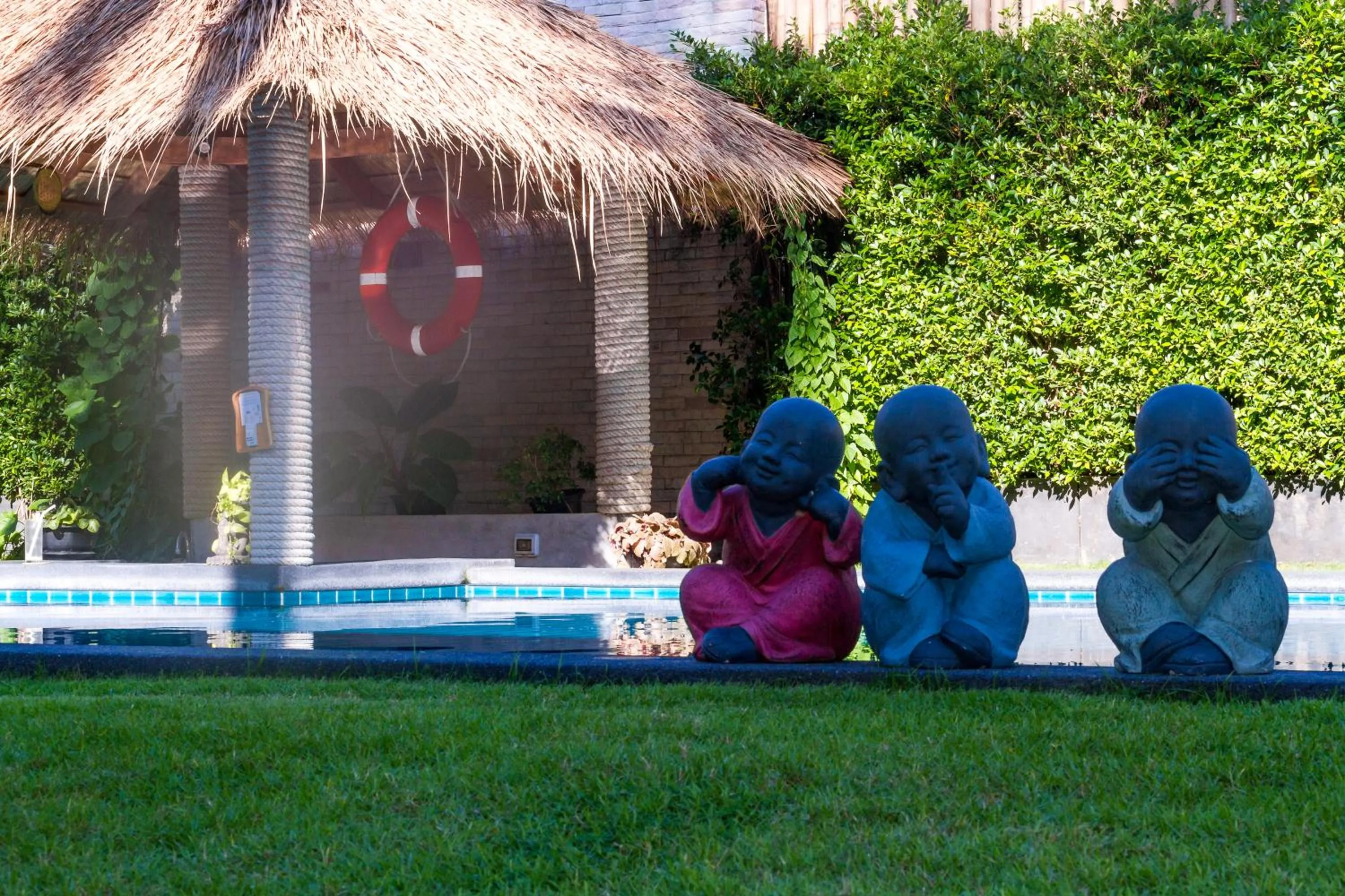 Swimming pool in Austrian Garden Hotel & Restaurant Patong