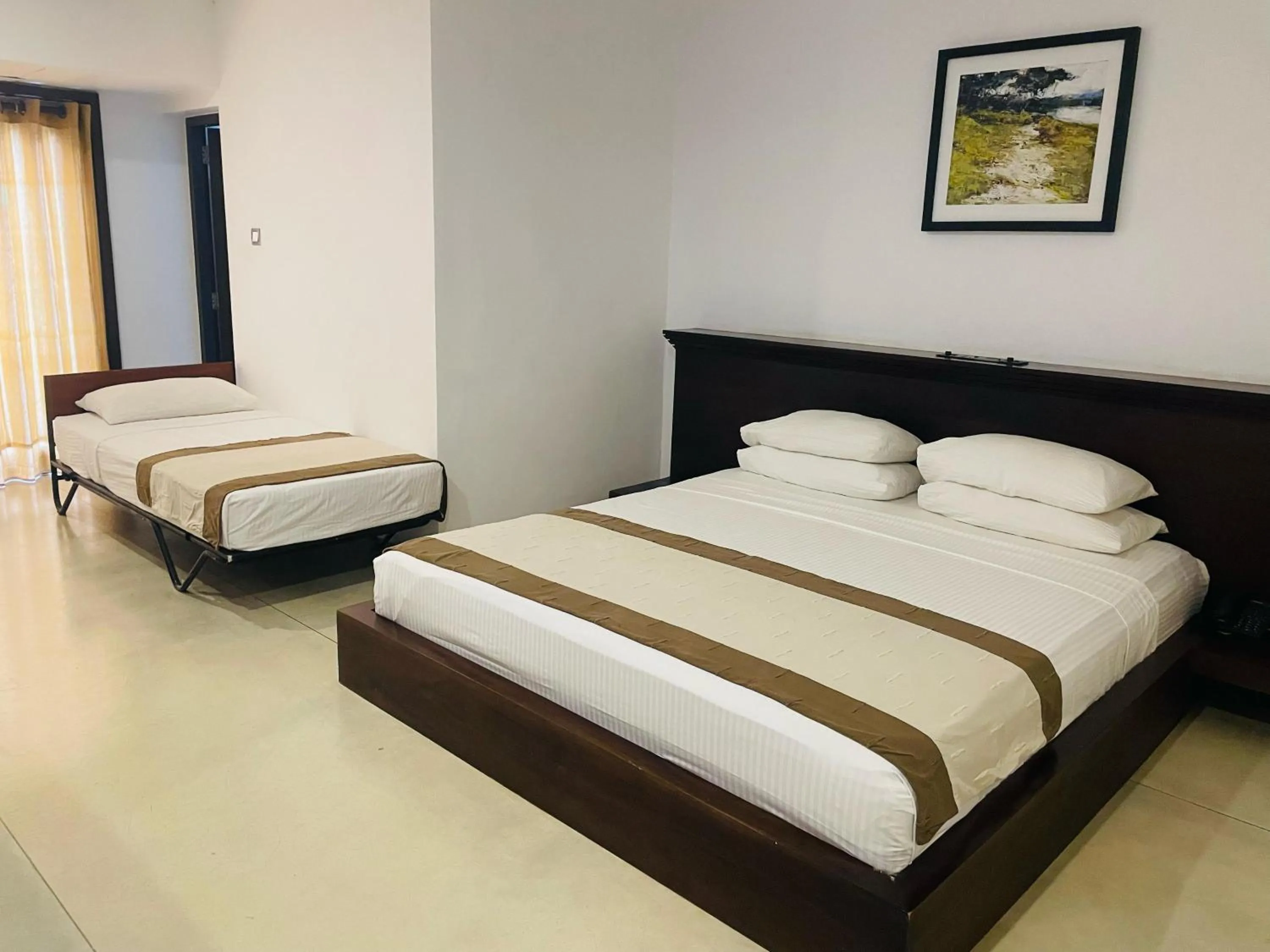 Bed in Rajarata Hotel Anuradhapura