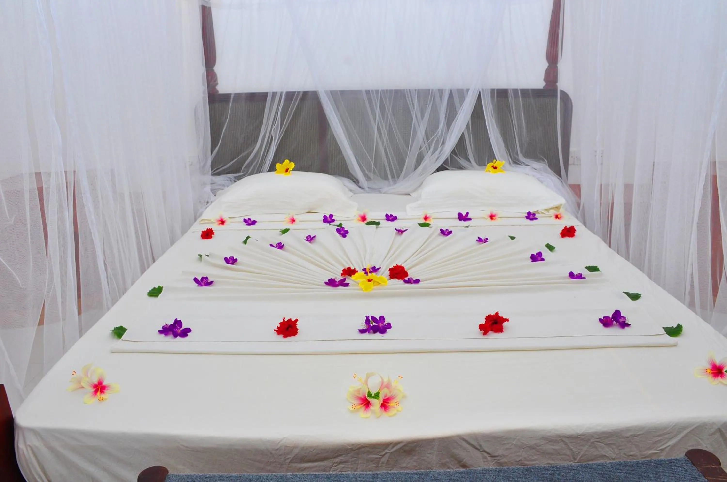 Bed in Bougain Villa