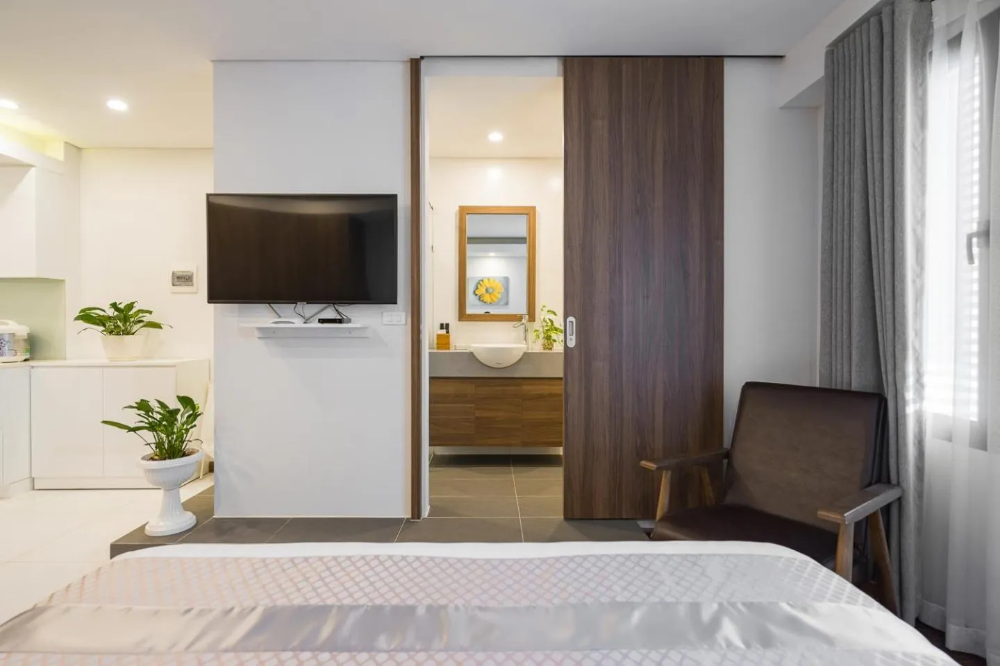 Bed in Narcissus Hotel & Apartment