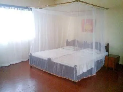 Bed in Secret Escape Nilaveli Ayurveda Hotel & Spa