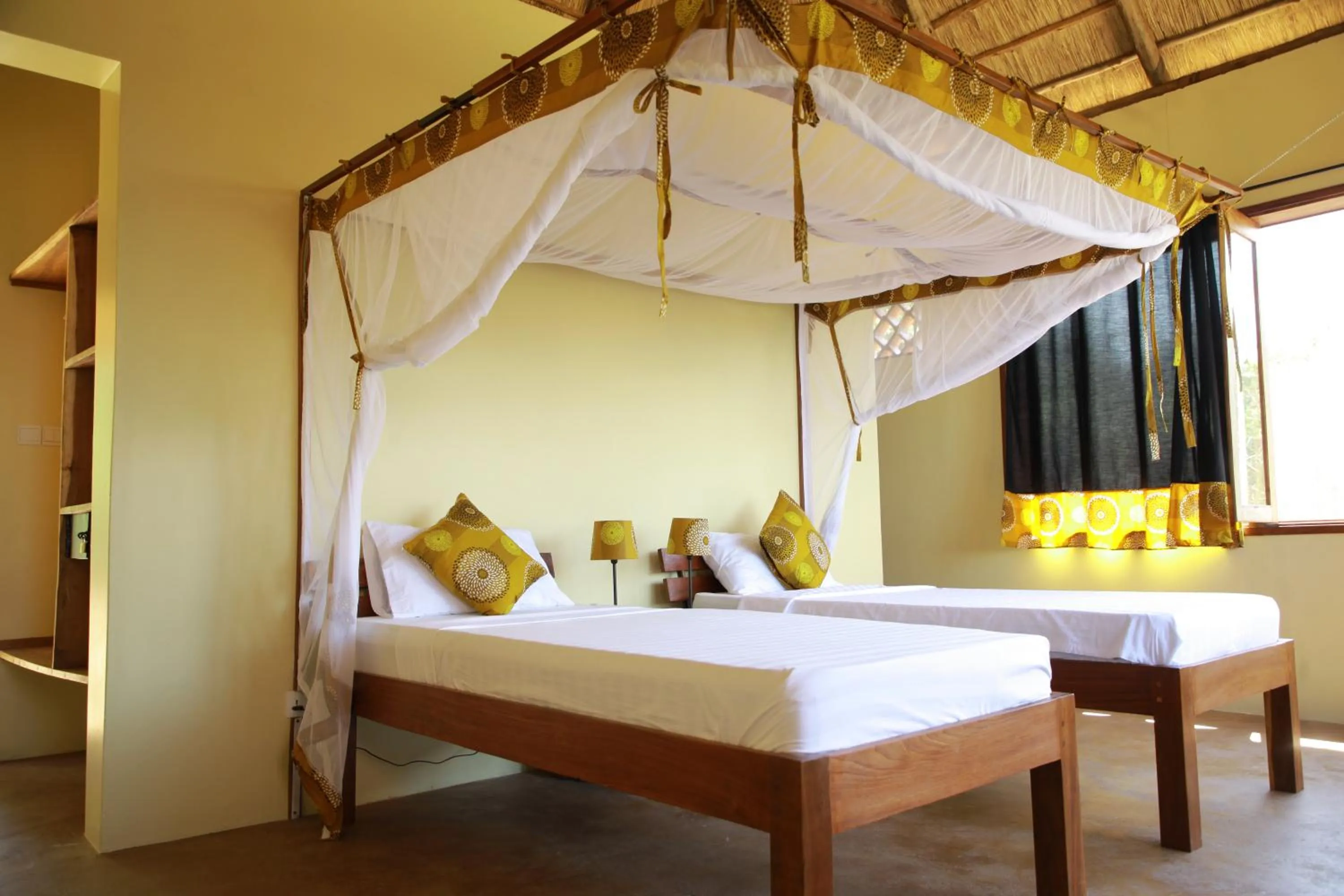Bed in Kikonko Lodge