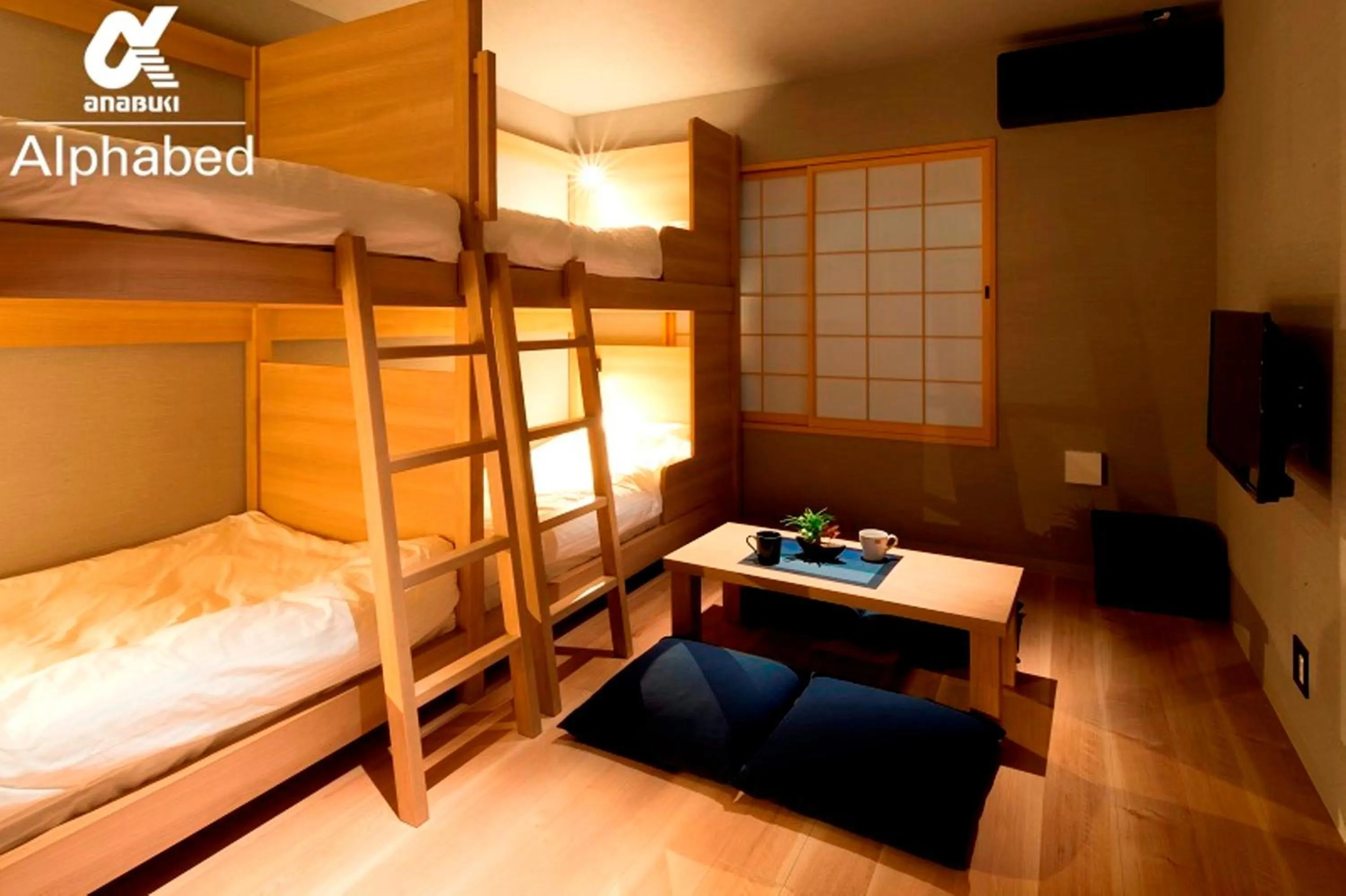 Bed in ALPHABED INN Takamatsuekimae