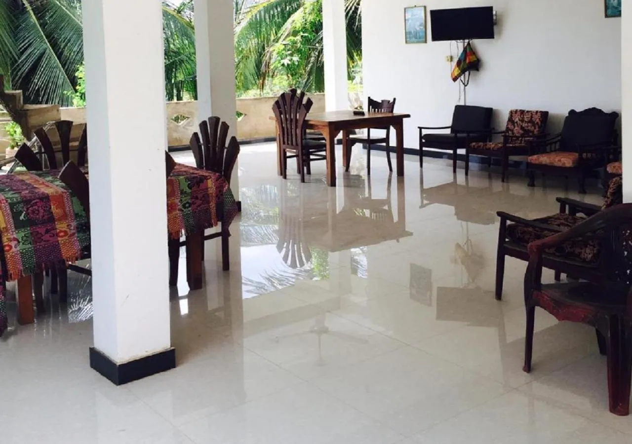 Communal lounge/ TV room in Pleasure Island Holiday Home