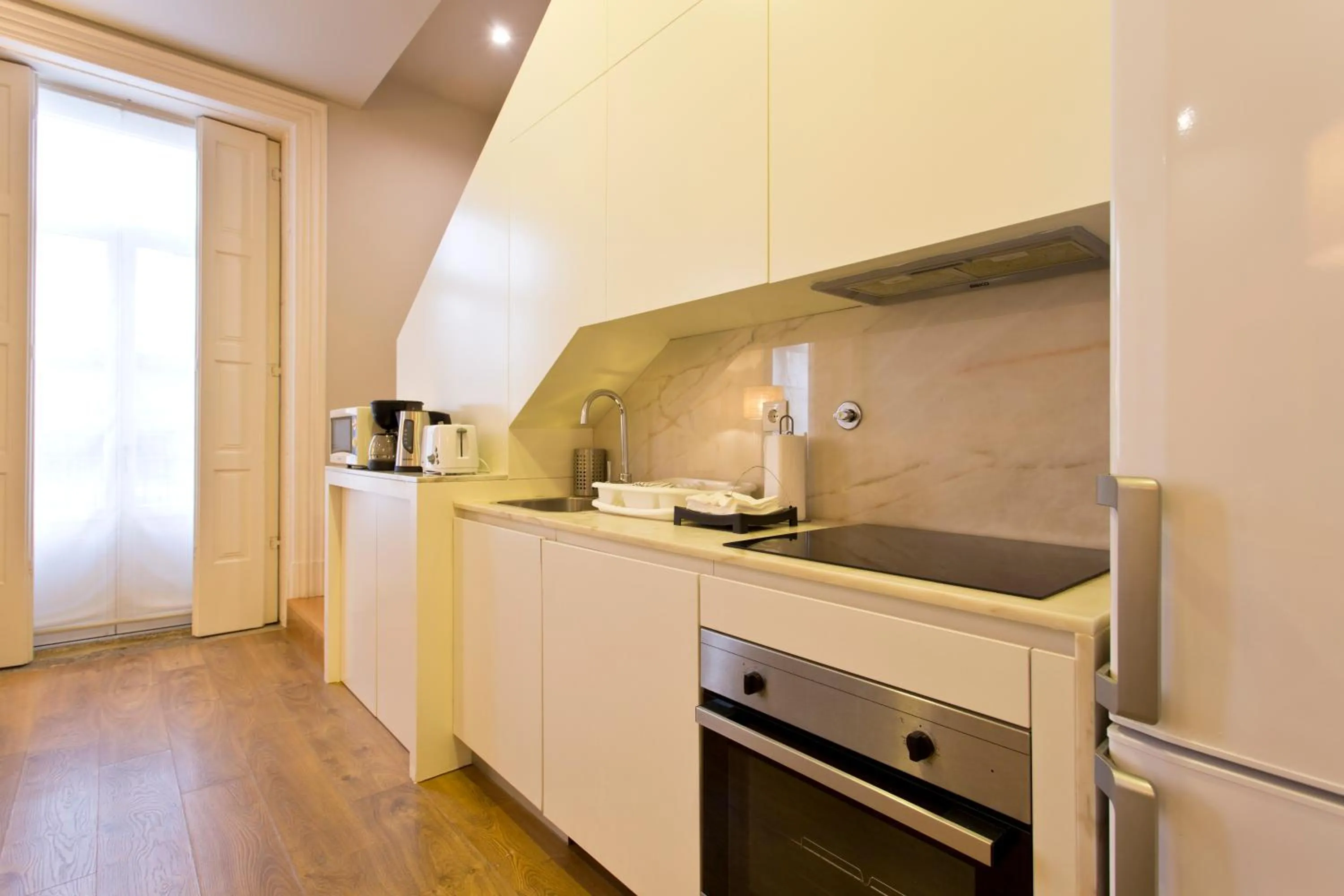 Kitchen or kitchenette in RVA - Porto Central Flats