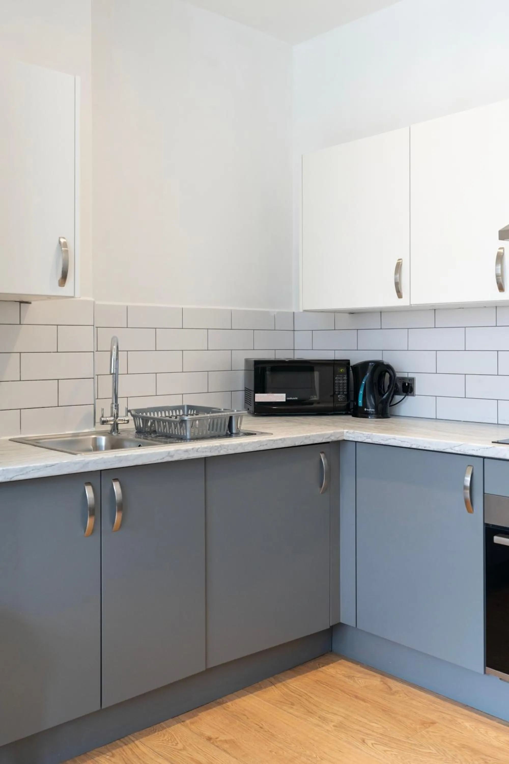 Kitchen or kitchenette in Shoreditch Apartments by DC London Rooms