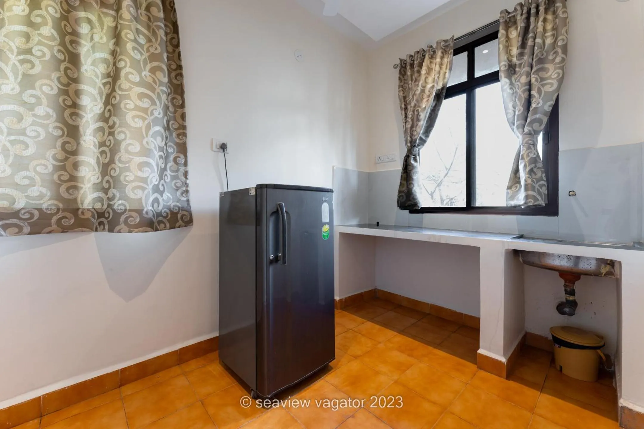 Kitchen or kitchenette in Sea View Holiday Vagator