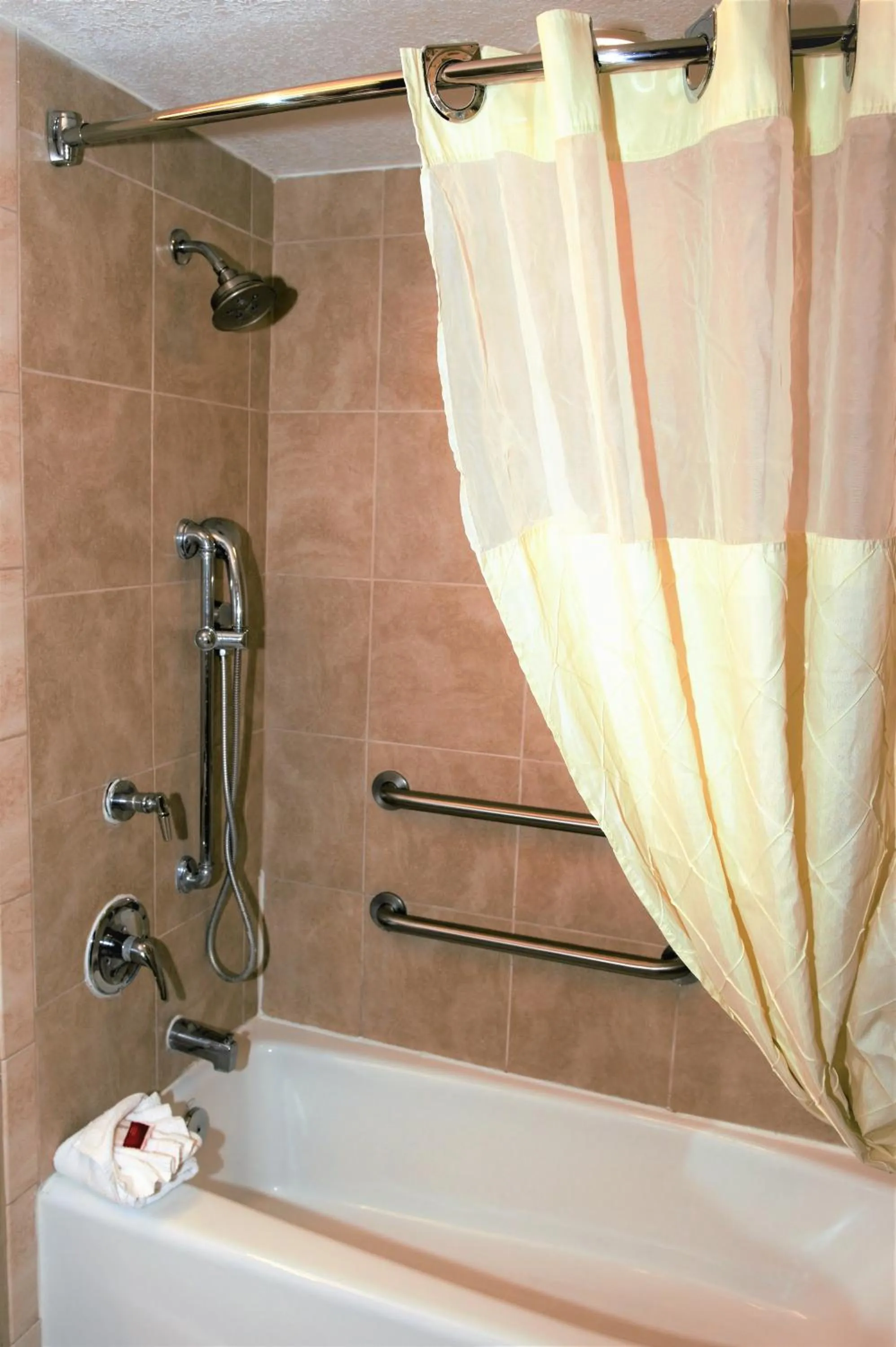 Shower in Microtel Inn & Suites by Wyndham Jacksonville Airport