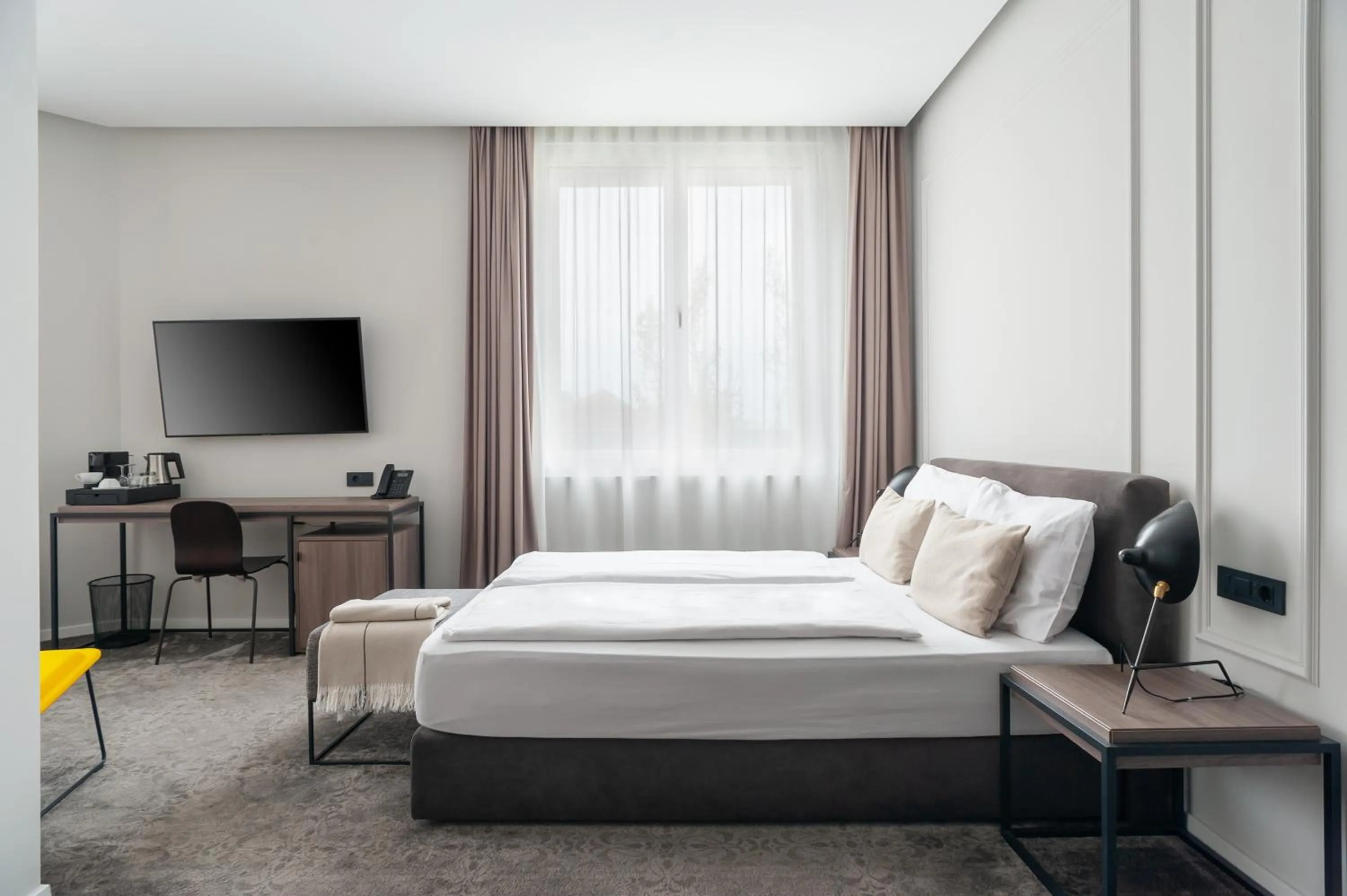 Bed in MANDA Heritage Hotel