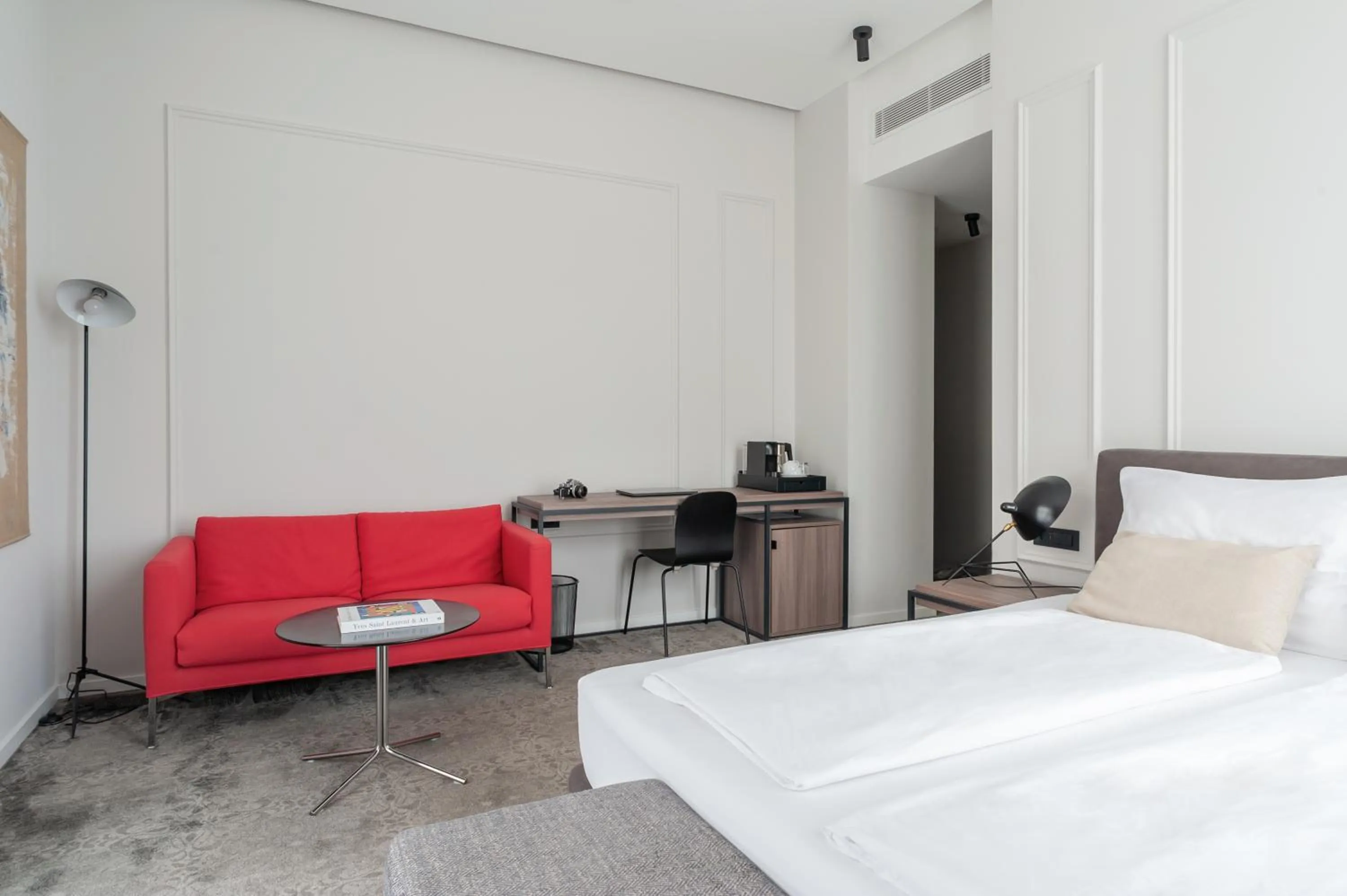 Seating area, Bed in MANDA Heritage Hotel