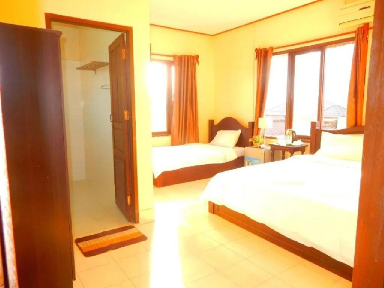 Photo of the whole room, Bed in Vang Vieng Camellia Hotel
