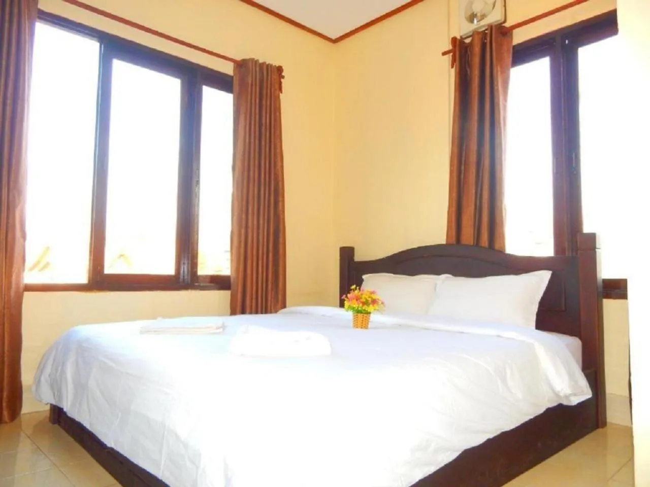 Photo of the whole room, Bed in Vang Vieng Camellia Hotel
