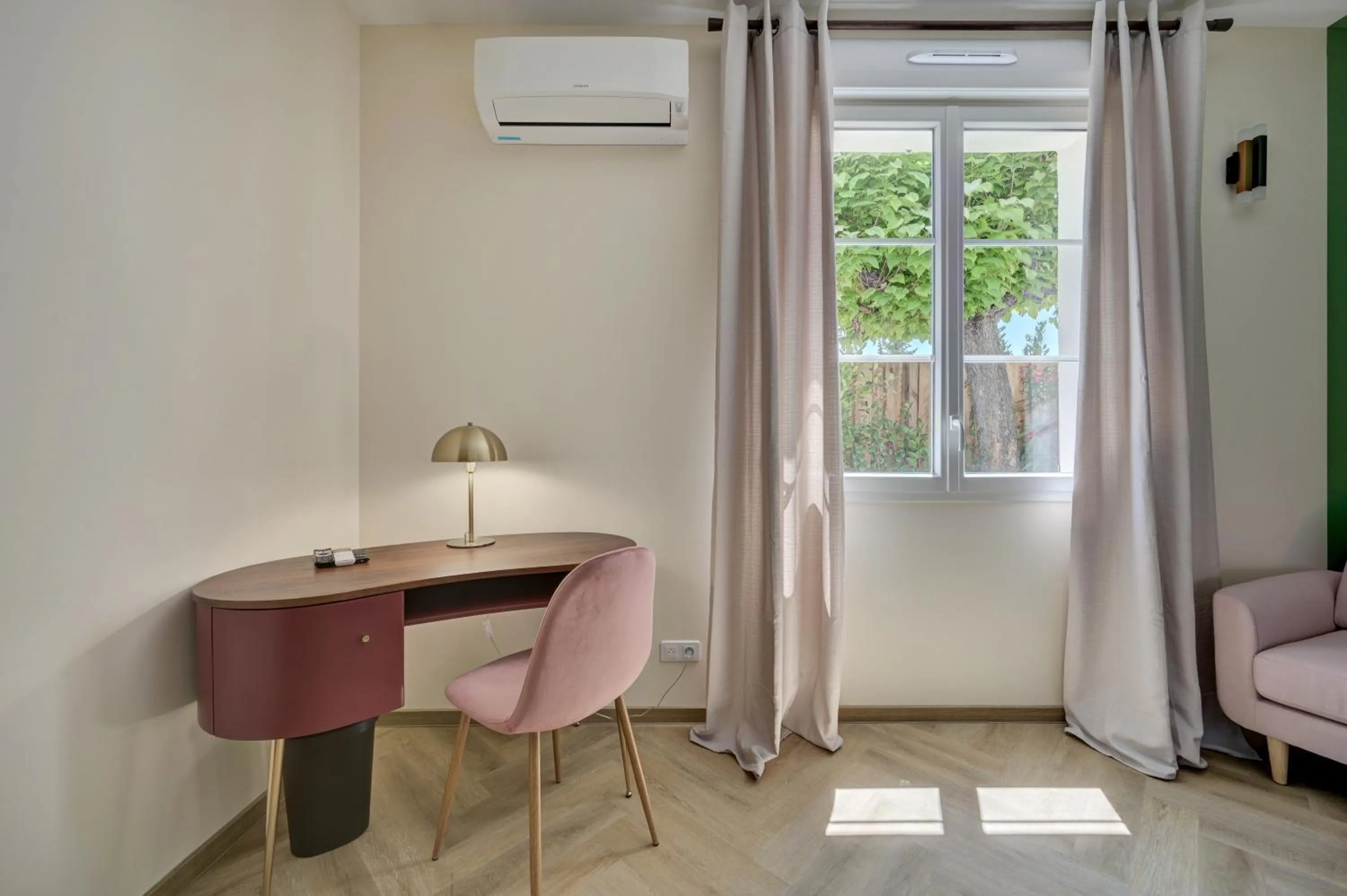 Seating area in Logis Hotel Le Blason de Provence