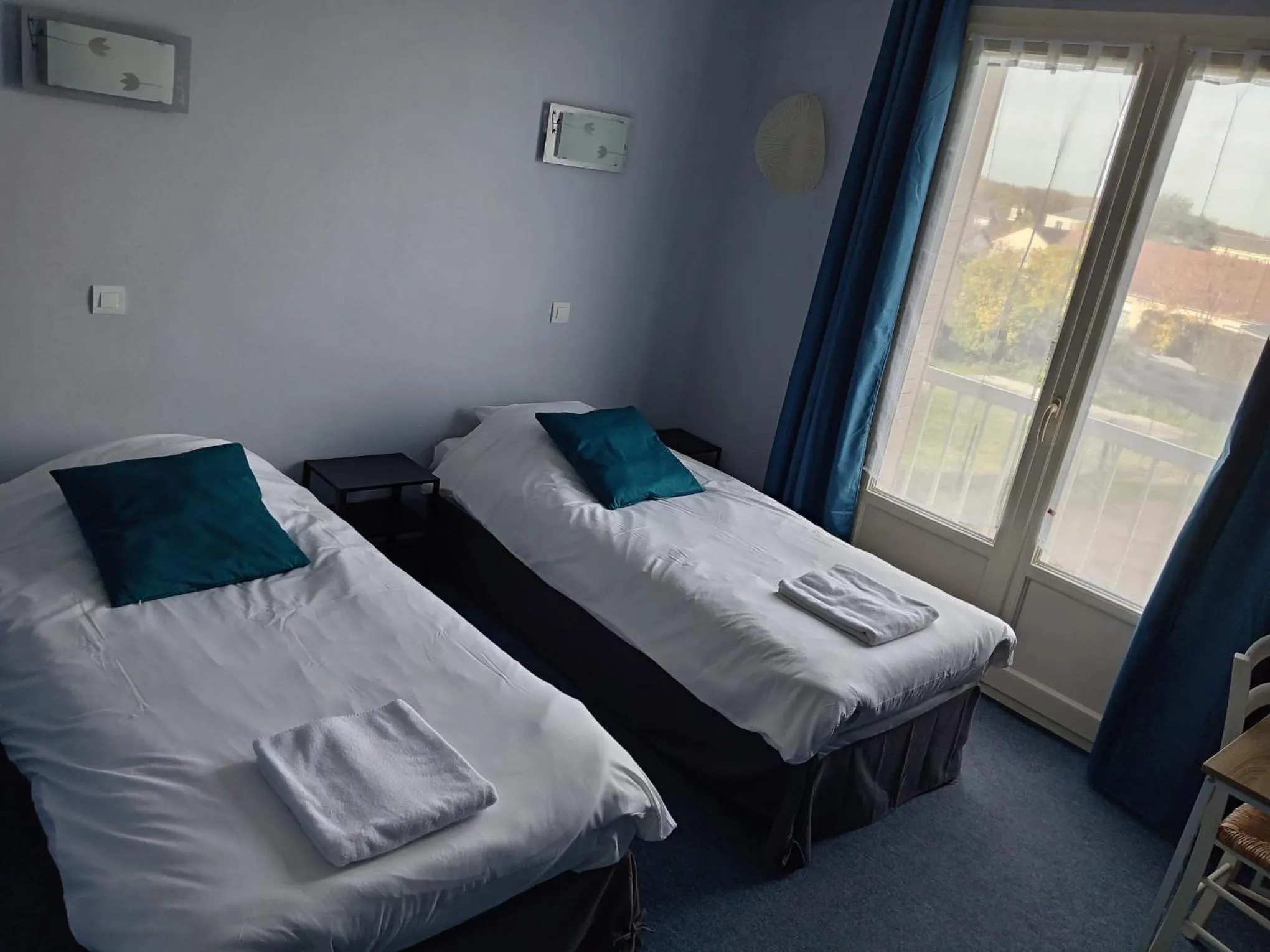 Bed in Hôtel Le Lyon Vert Commentry