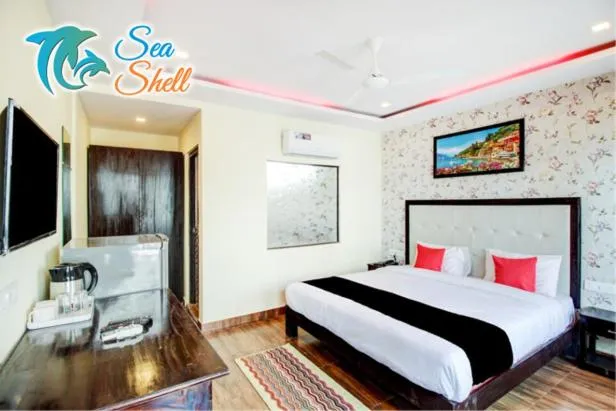Bedroom, Bed in Sea Shell Beach Cottages & Suites