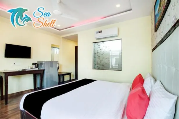 TV and multimedia, Bed in Sea Shell Beach Cottages & Suites