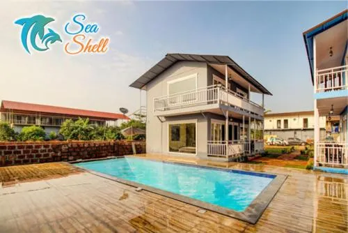 Swimming pool in Sea Shell Beach Cottages & Suites