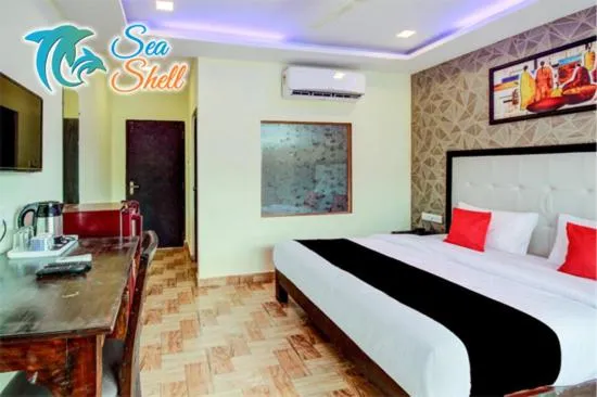 Photo of the whole room, Bed in Sea Shell Beach Cottages & Suites