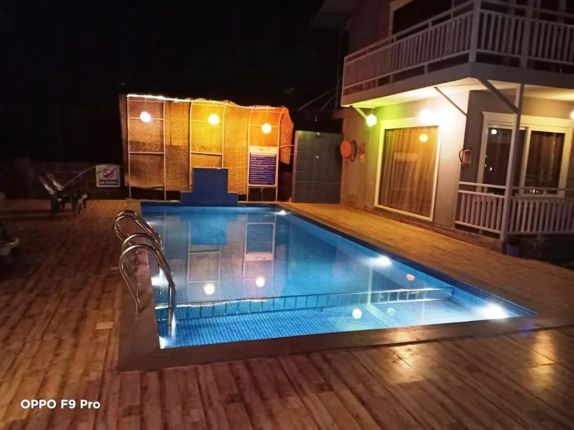 Swimming pool in Sea Shell Beach Cottages & Suites