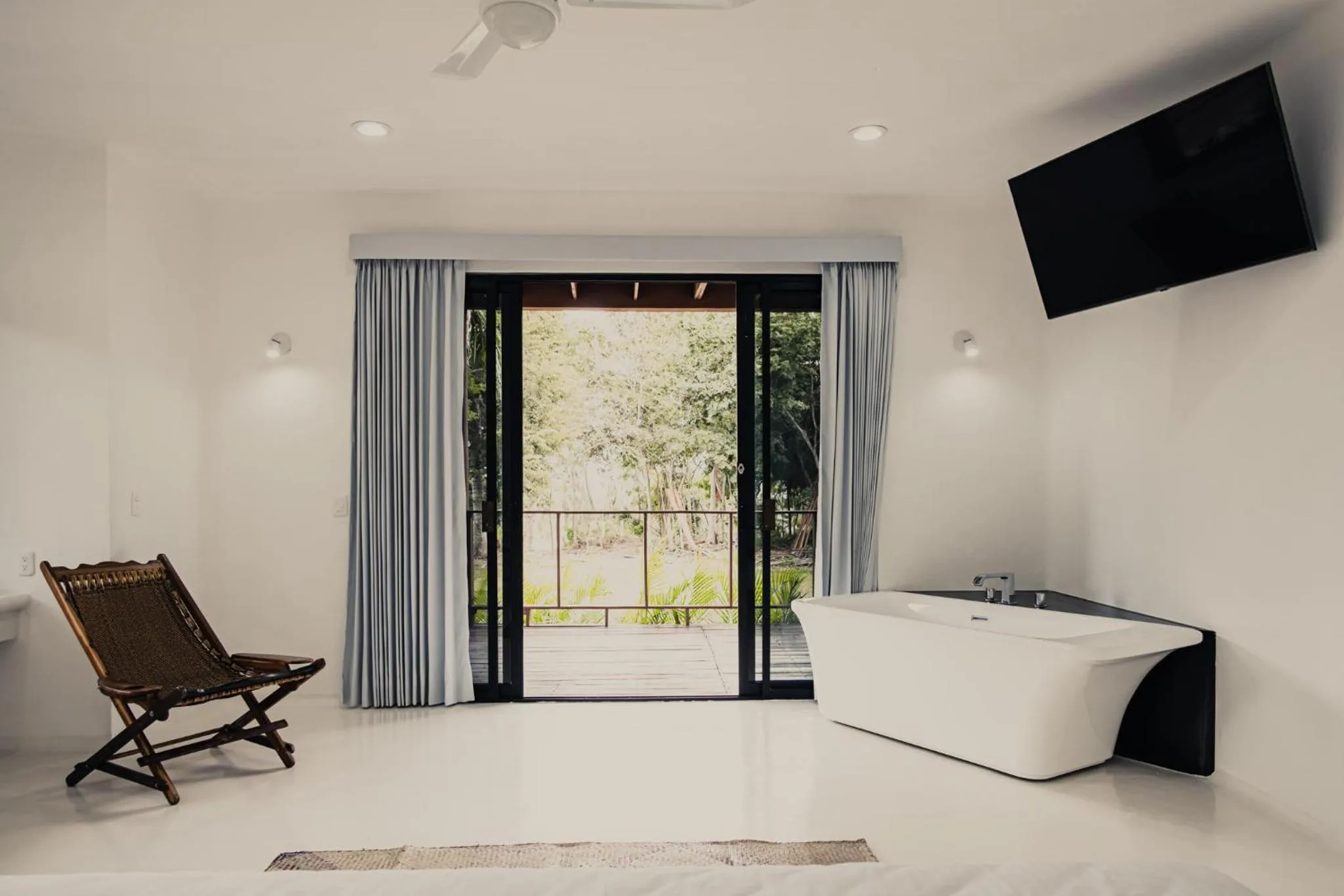 Bed in Royal Palm Bacalar Cabañas & Lagoon Club