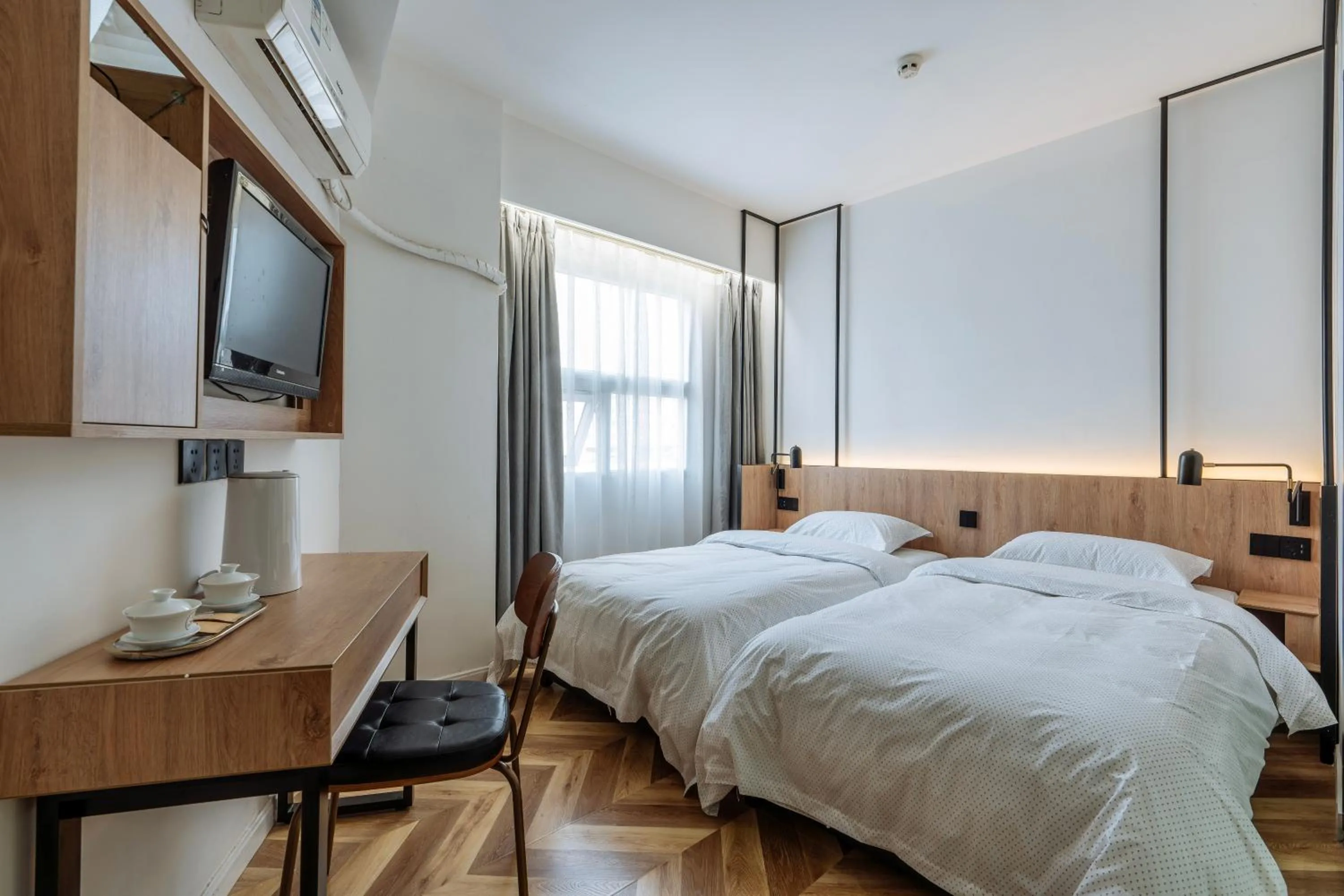 Photo of the whole room, Bed in Chengdu Local Tea Hostel - Short Walk To Taikooli - Chill & Social Coffee Lounge - Metro downstairs - Free Activities - Friendly English Speaking Staff - Tibet, Panda, Buddha & Snow Mountain Tours