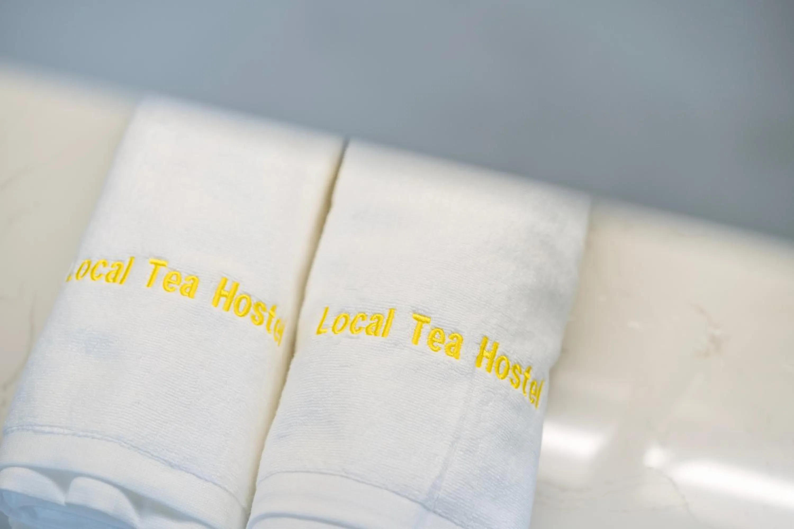 towels in Chengdu Local Tea Hostel - Short Walk To Taikooli - Chill & Social Coffee Lounge - Metro downstairs - Free Activities - Friendly English Speaking Staff - Tibet, Panda, Buddha & Snow Mountain Tours