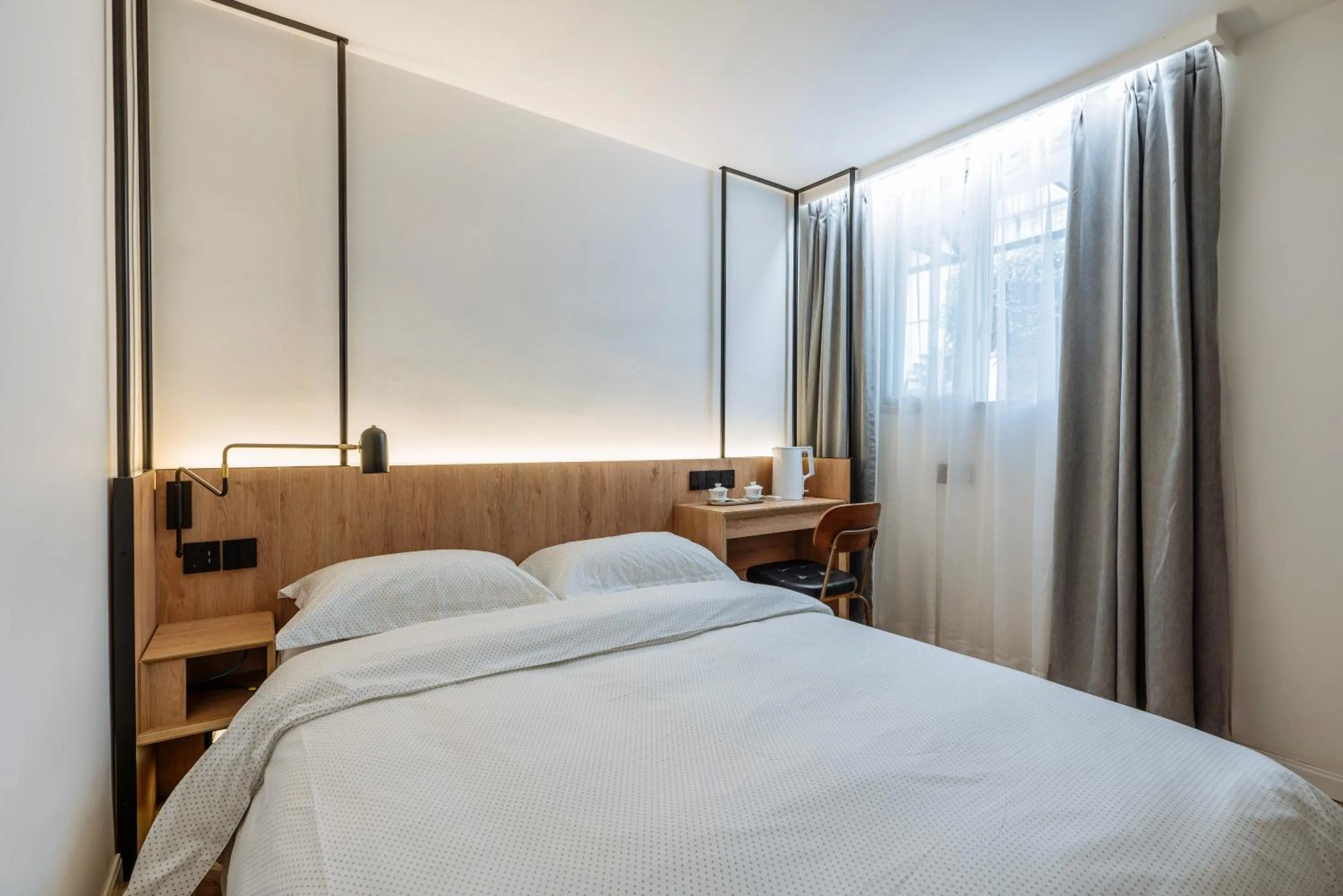 Photo of the whole room, Bed in Chengdu Local Tea Hostel - Short Walk To Taikooli - Chill & Social Coffee Lounge - Metro downstairs - Free Activities - Friendly English Speaking Staff - Tibet, Panda, Buddha & Snow Mountain Tours