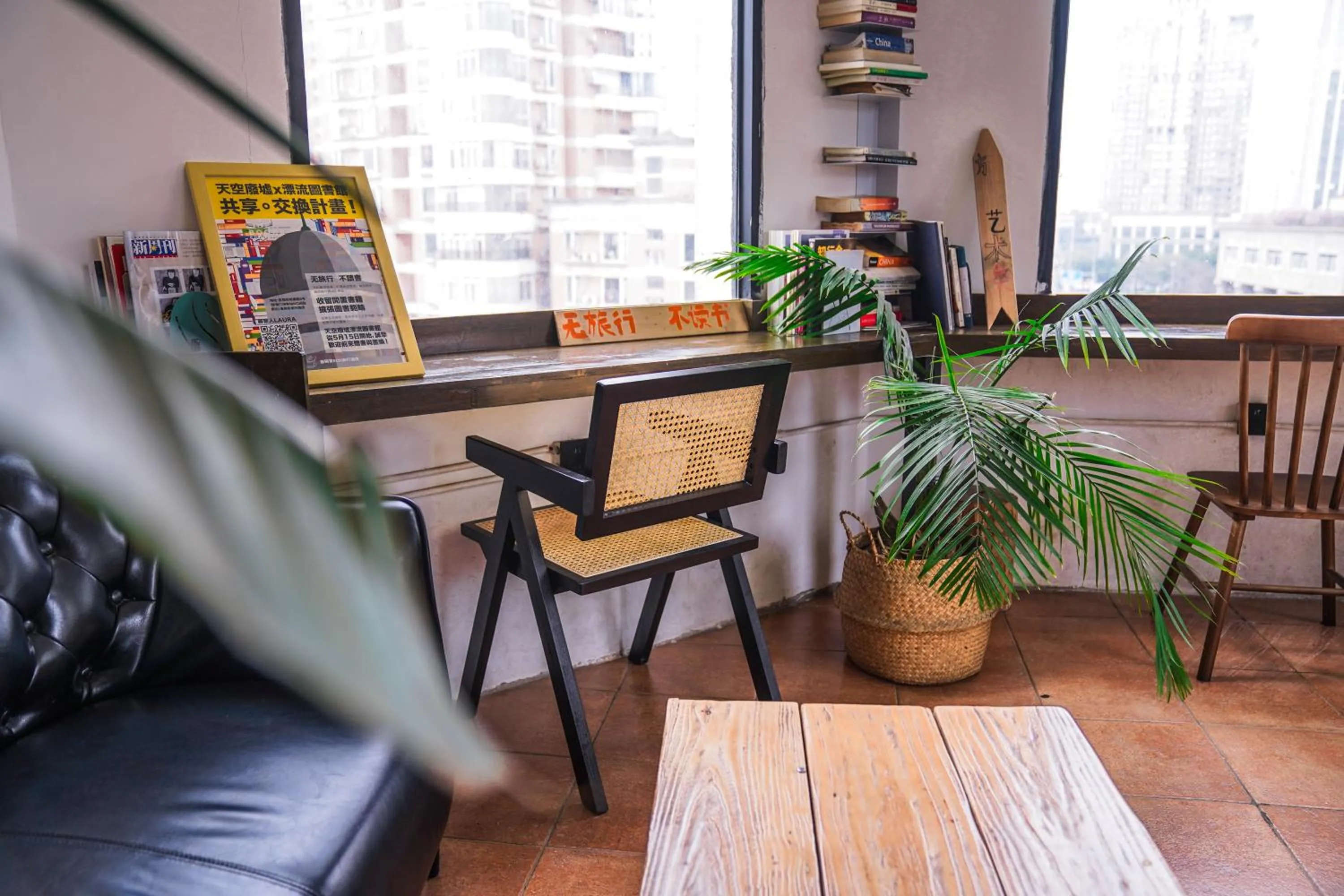 Seating area in Chengdu Local Tea Hostel - Short Walk To Taikooli - Chill & Social Coffee Lounge - Metro downstairs - Free Activities - Friendly English Speaking Staff - Tibet, Panda, Buddha & Snow Mountain Tours