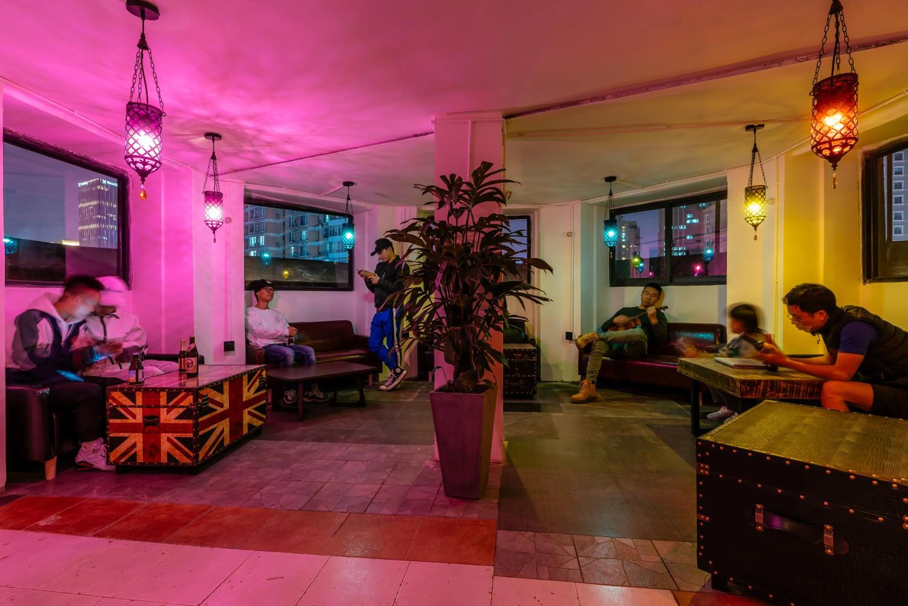 People in Chengdu Local Tea Hostel - Short Walk To Taikooli - Chill & Social Coffee Lounge - Metro downstairs - Free Activities - Friendly English Speaking Staff - Tibet, Panda, Buddha & Snow Mountain Tours