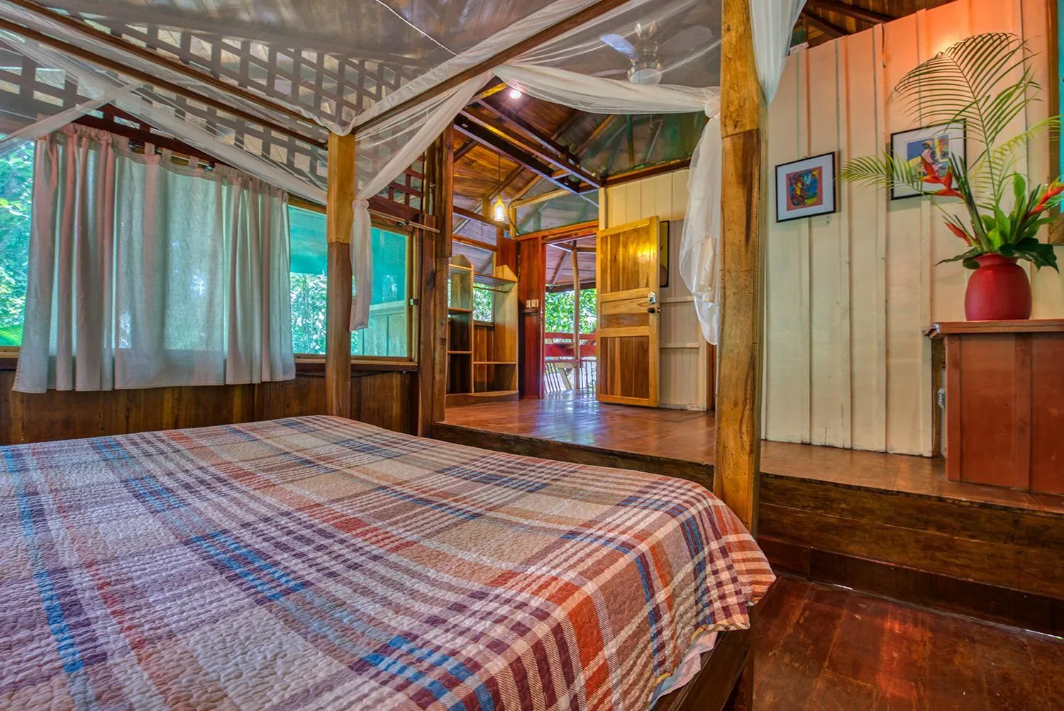 Bed in Tree House Beachfront Lodge