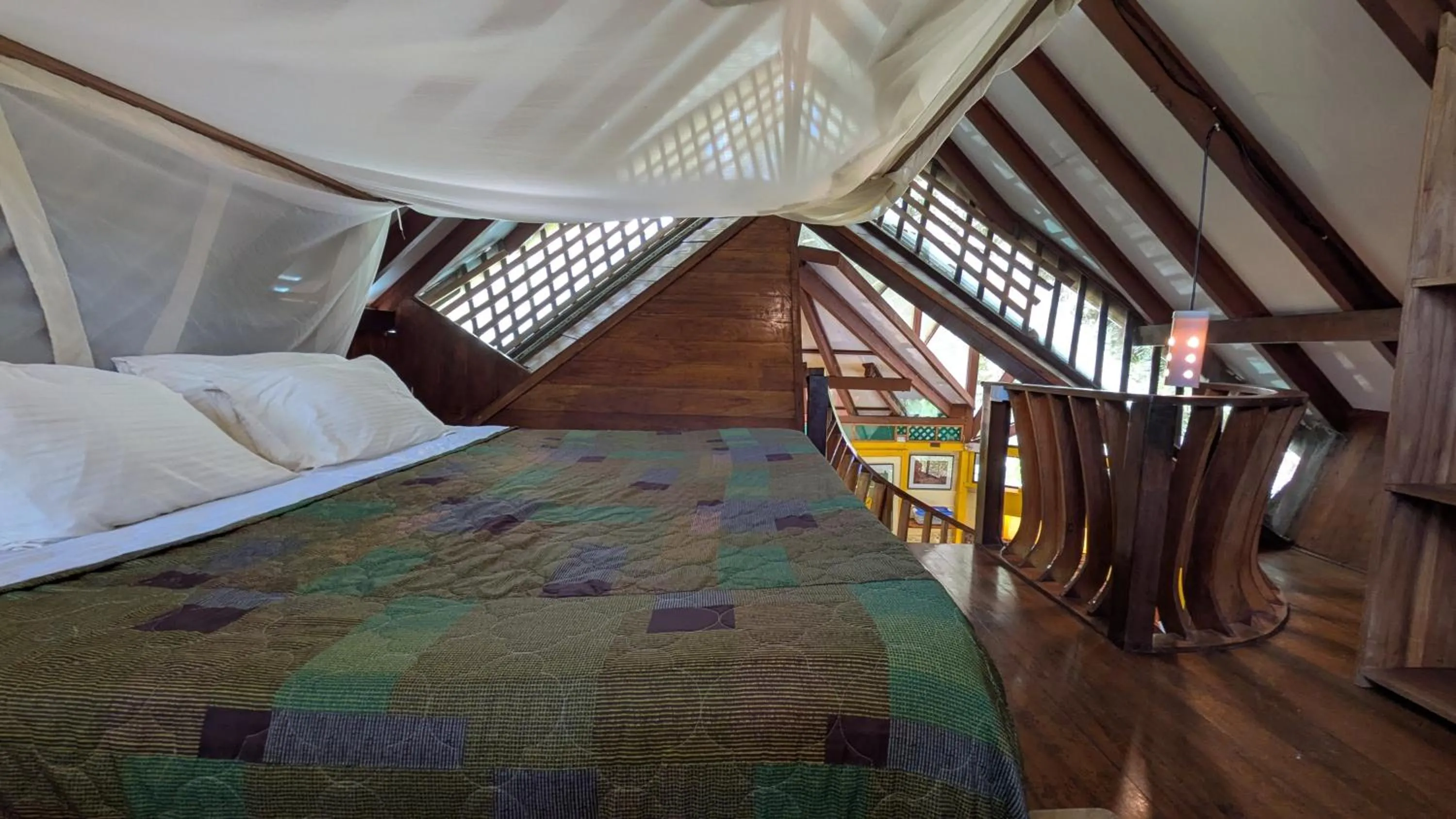 Bedroom, Bed in Tree House Beachfront Lodge
