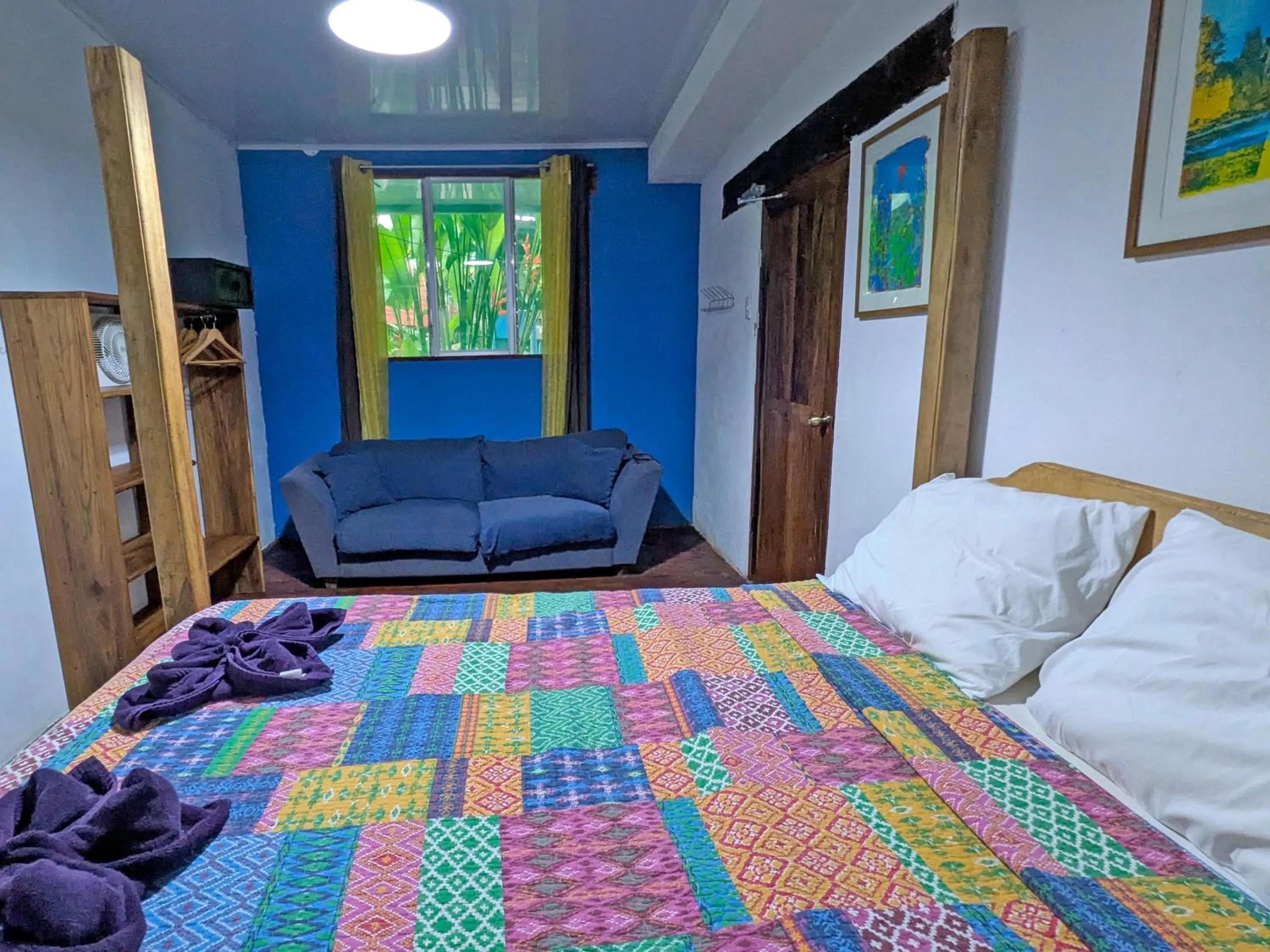 Bed in Tree House Beachfront Lodge