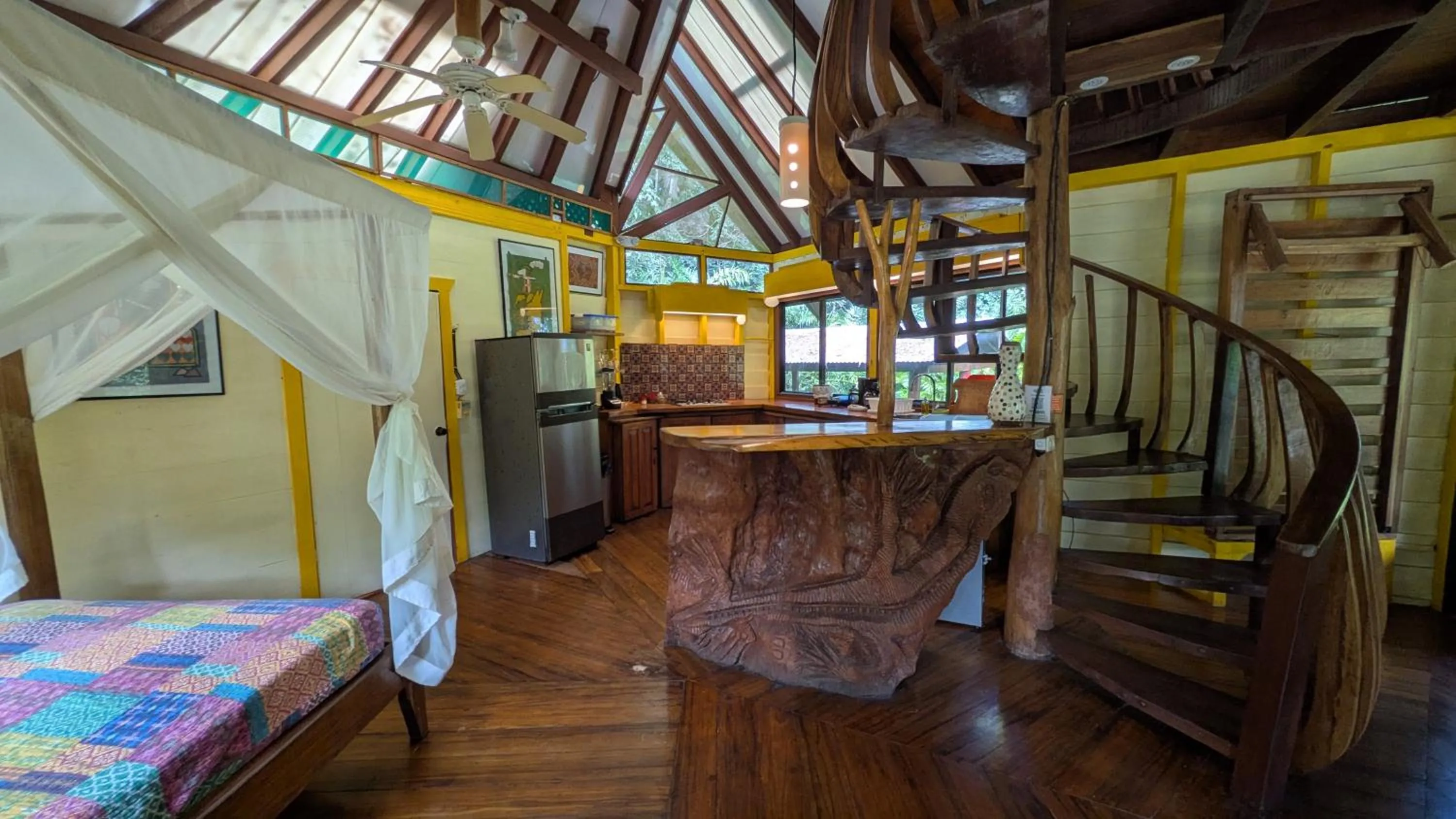 Bedroom in Tree House Beachfront Lodge