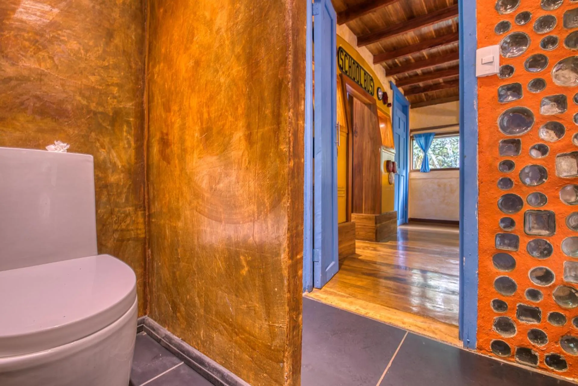 Toilet in Tree House Beachfront Lodge