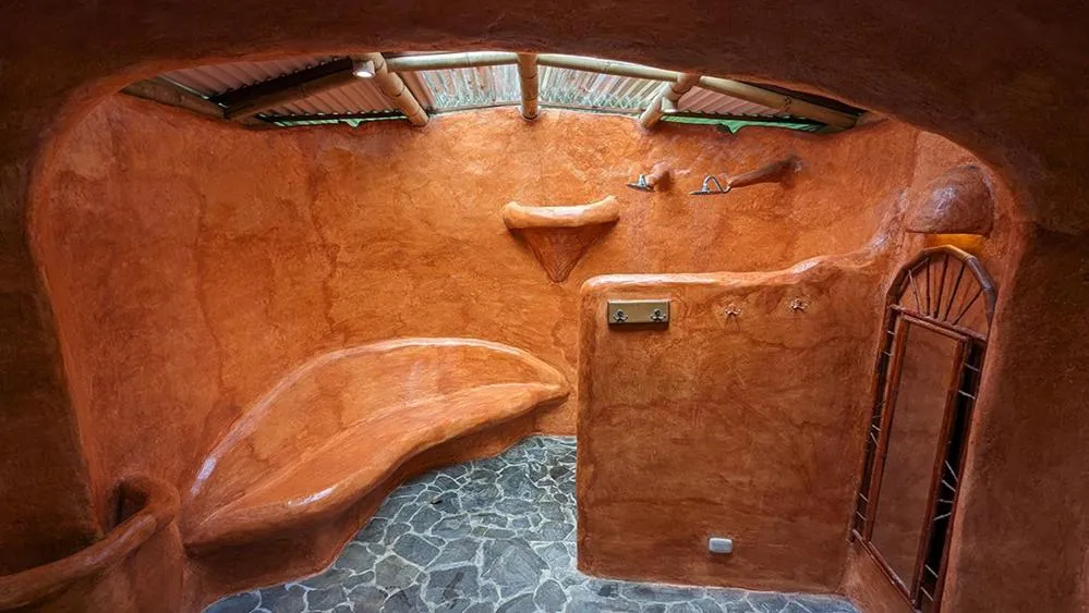 Bathroom in Tree House Beachfront Lodge