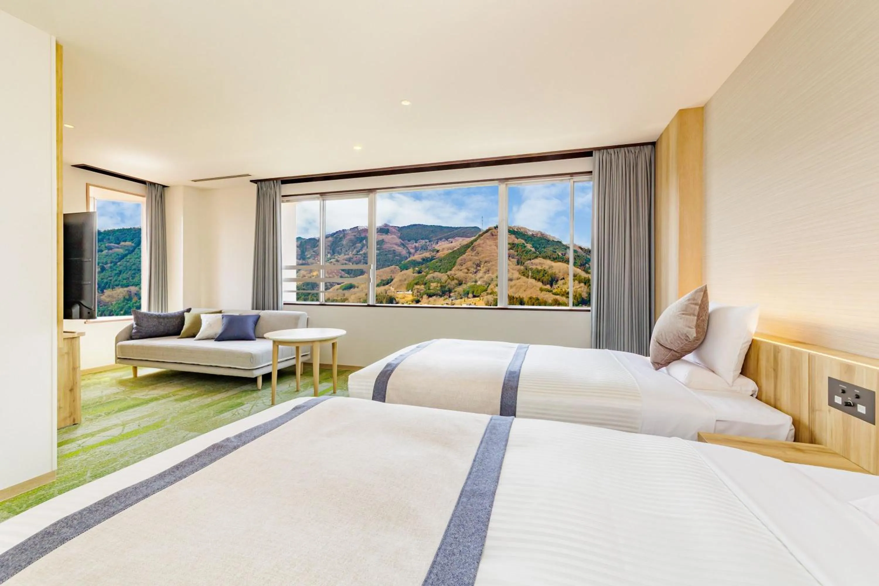 Photo of the whole room, Bed in KAMENOI HOTEL Nagatoro Yorii