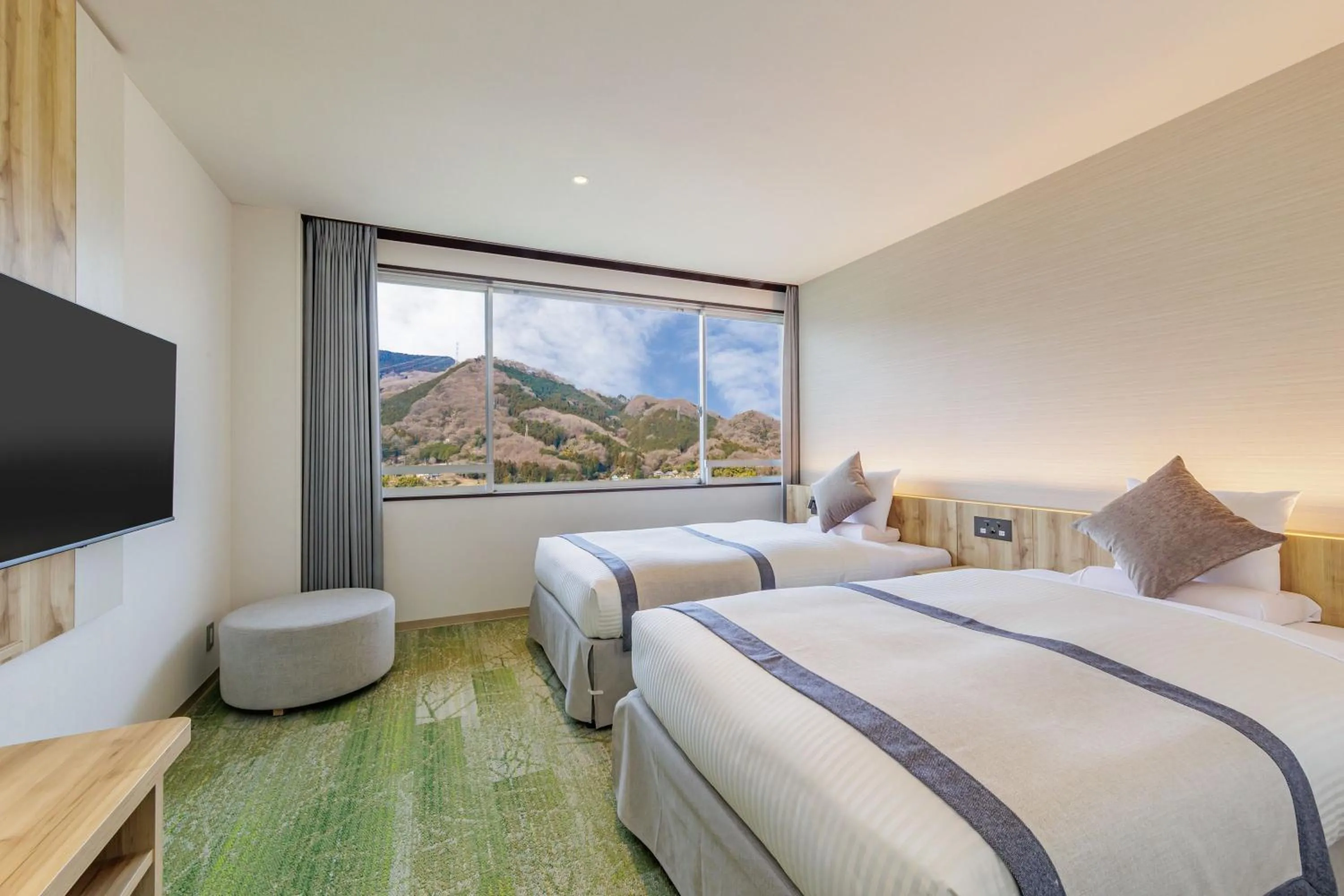 Photo of the whole room, Bed in KAMENOI HOTEL Nagatoro Yorii