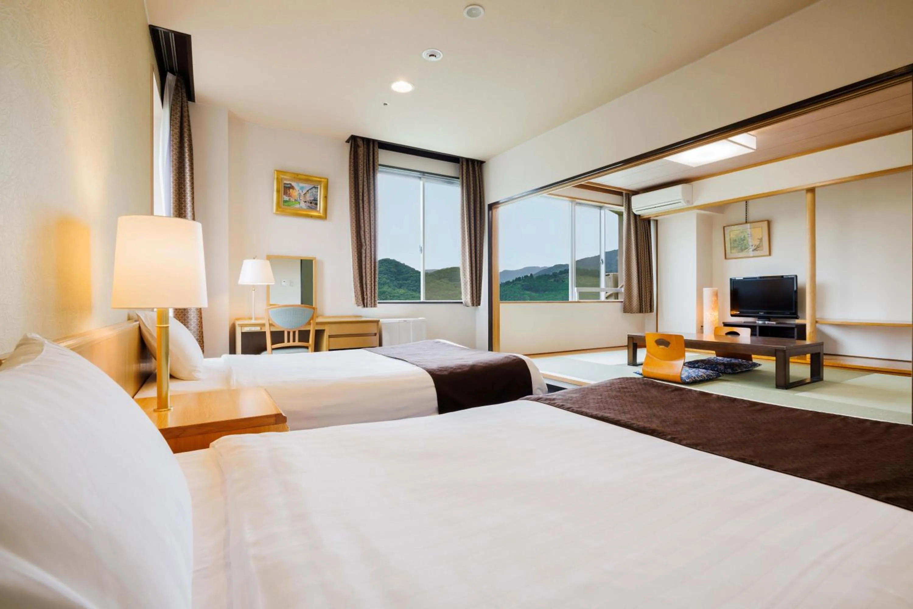 Photo of the whole room, Bed in KAMENOI HOTEL Nagatoro Yorii