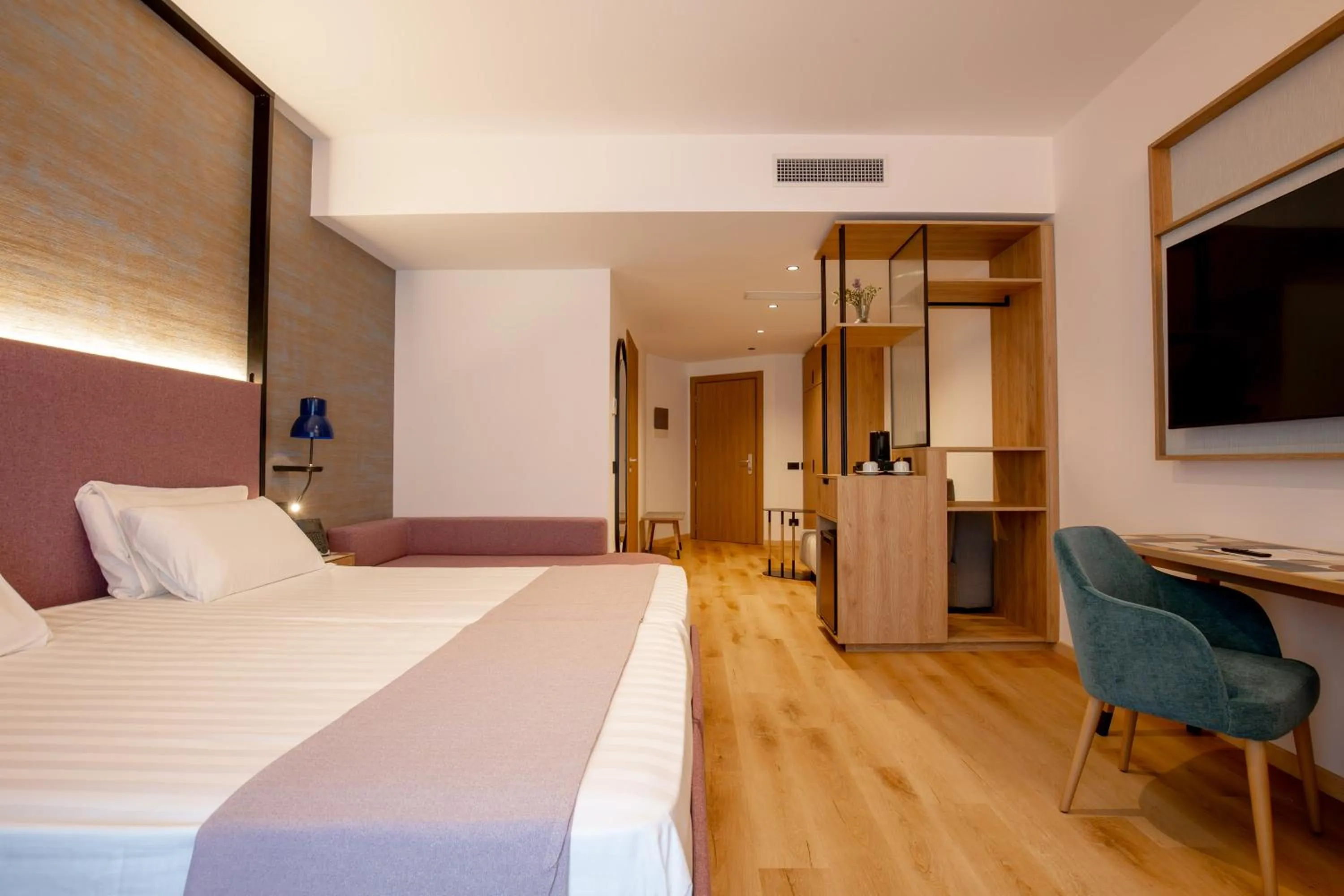 Bed in Hotel Poseidon