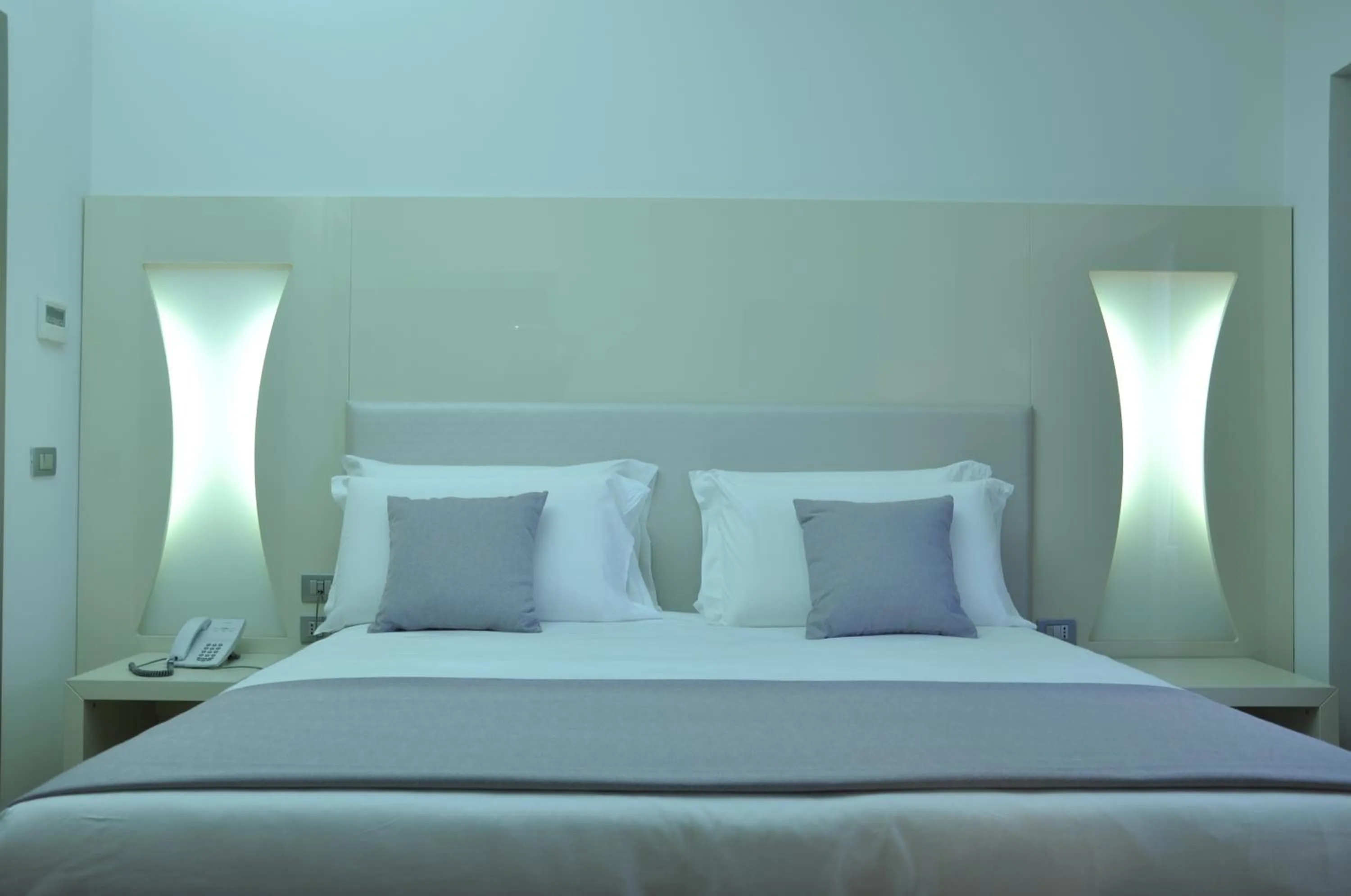 Bed in Hotel Poseidon