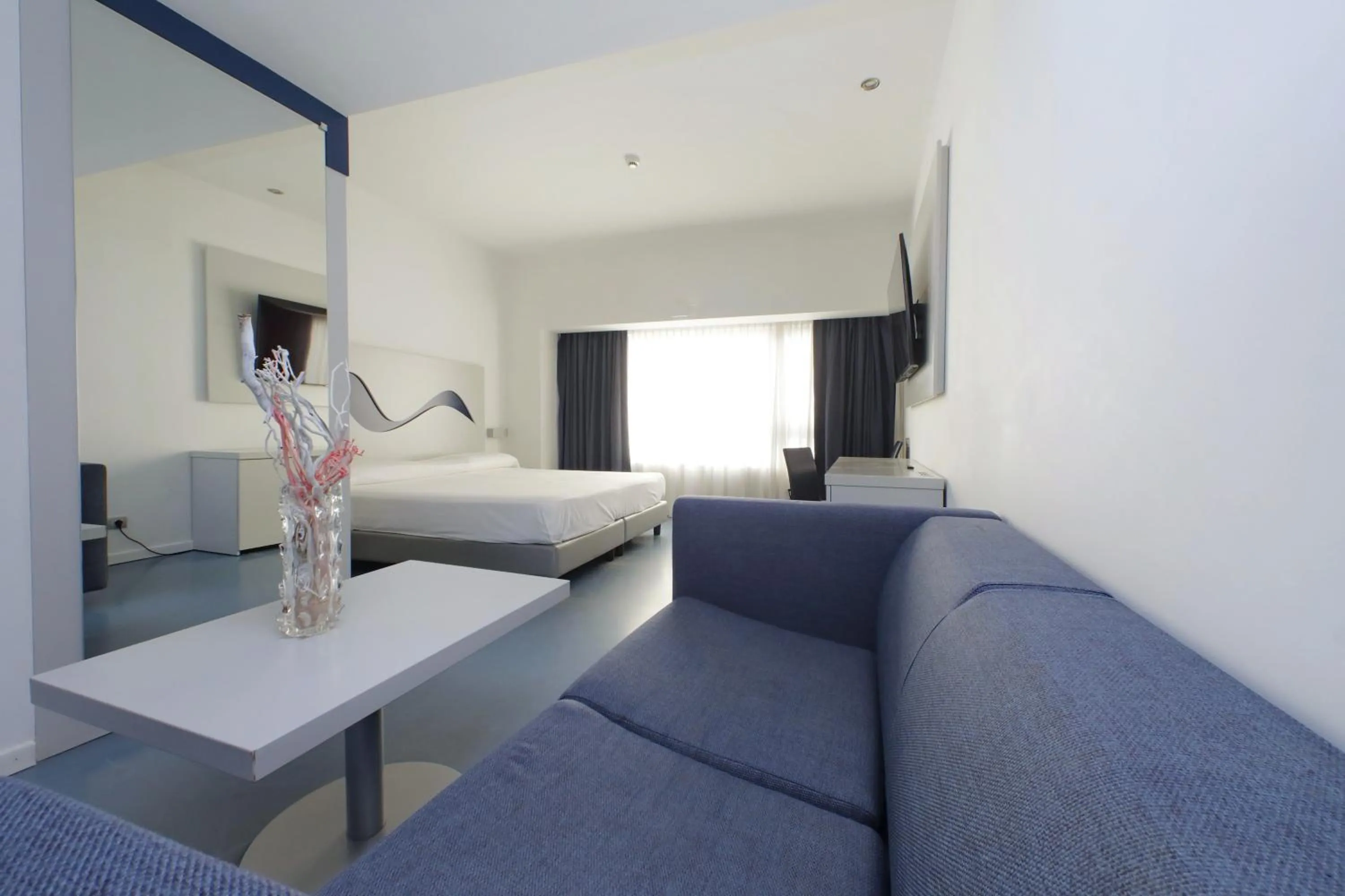 Bed in Hotel Poseidon