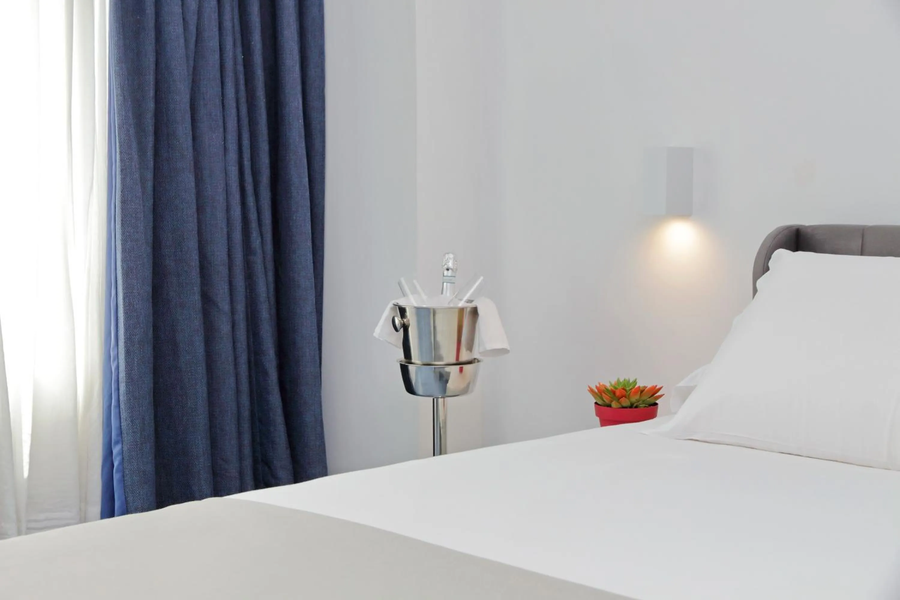 Bed in Hotel Poseidon