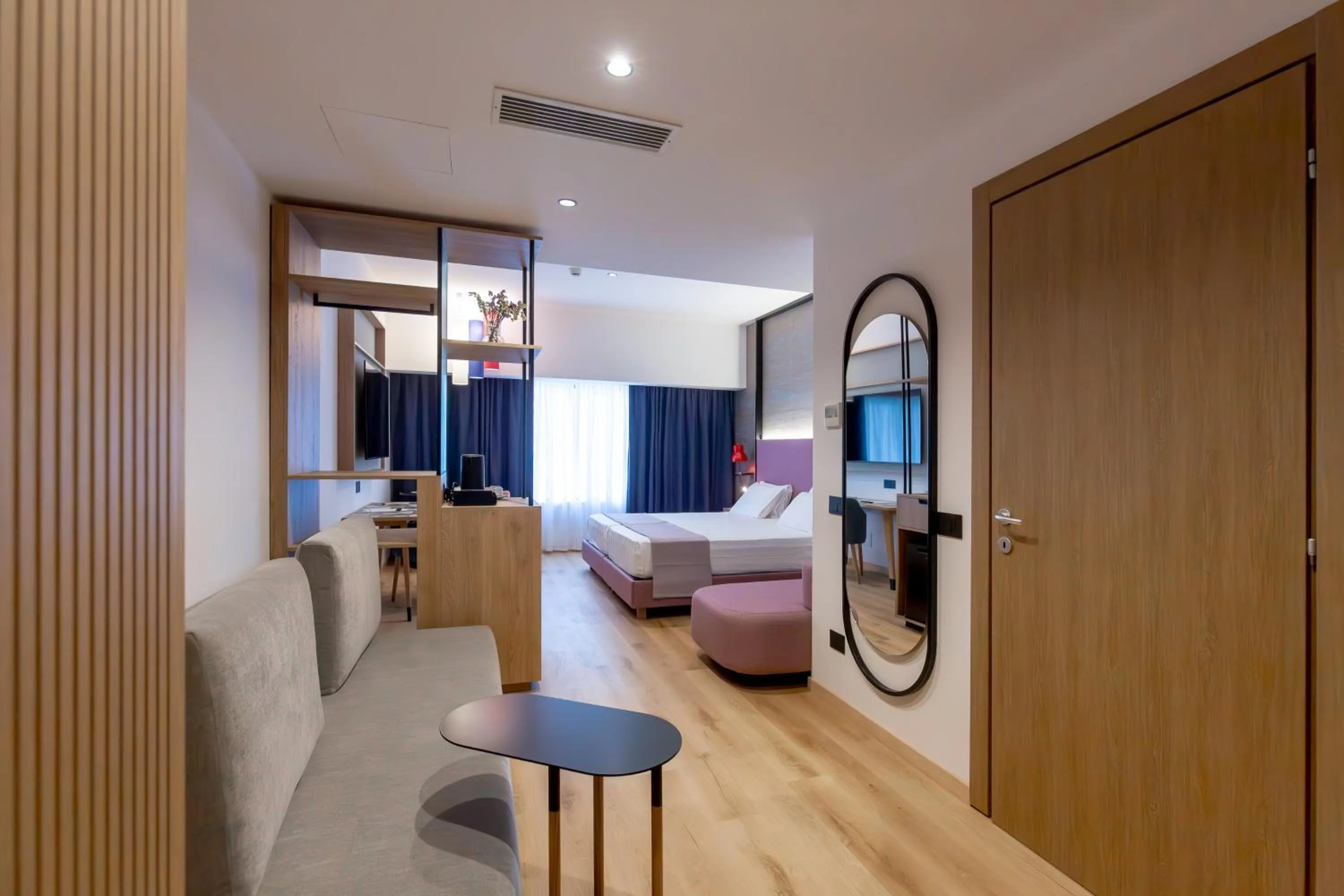 Bed in Hotel Poseidon