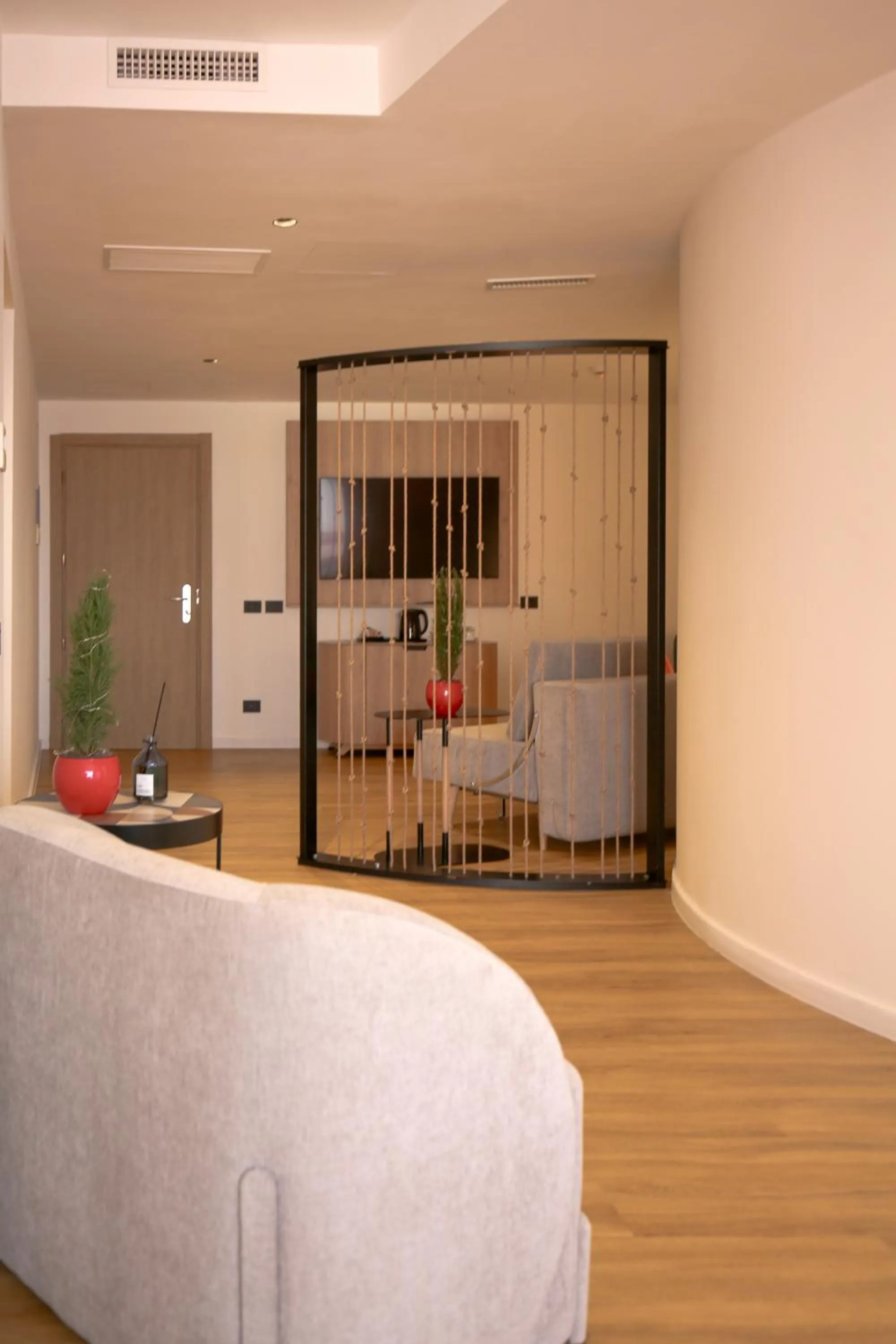 Living room, Bed in Hotel Poseidon