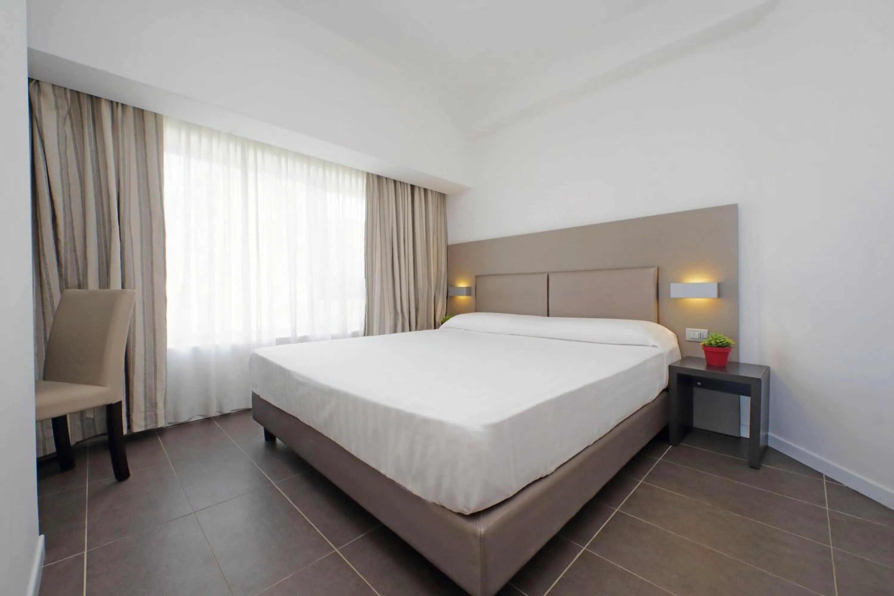 Bedroom, Bed in Hotel Poseidon